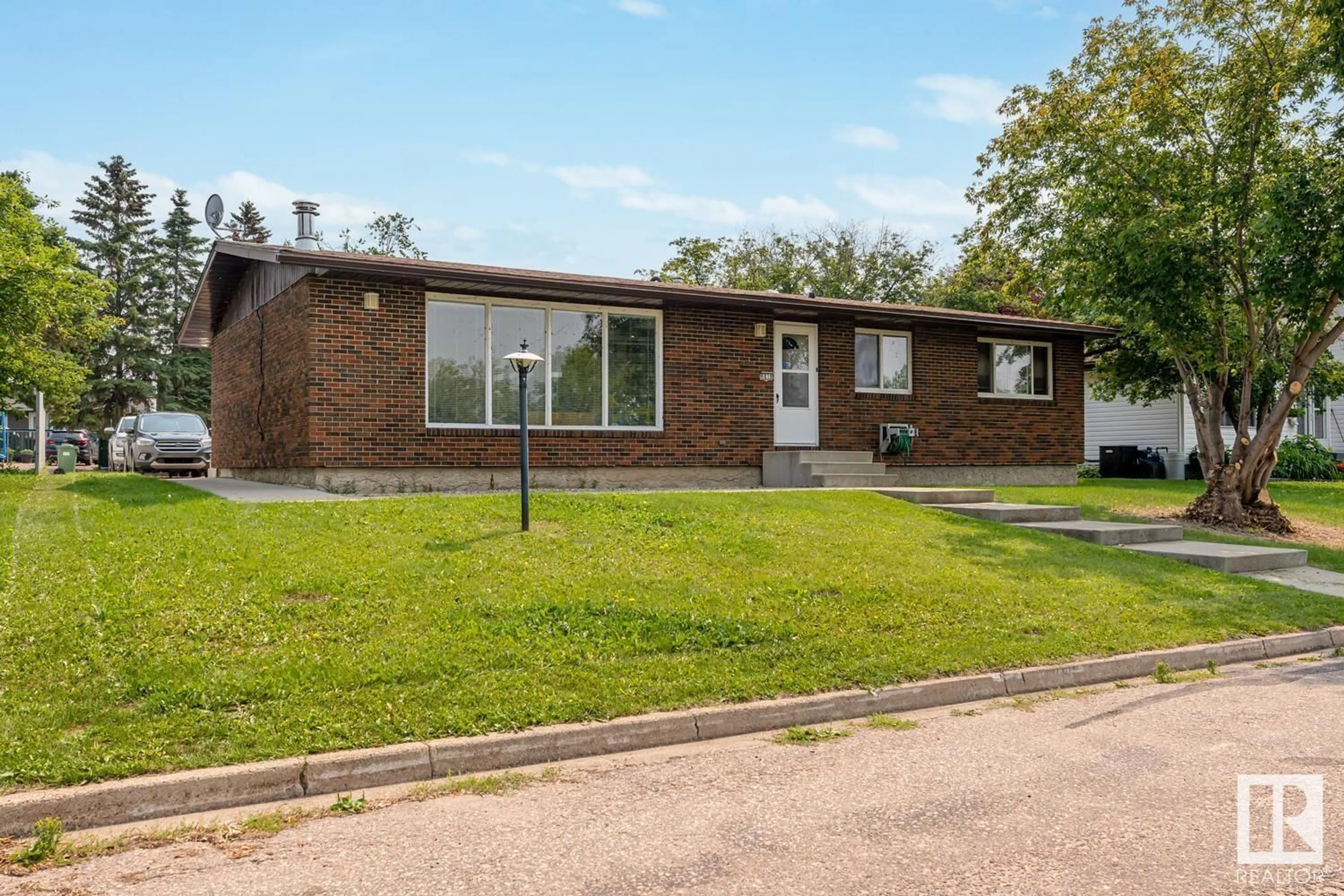 Home with brick exterior material, street for 4819 LAKESHORE DR, Bonnyville Town Alberta T9N1P2