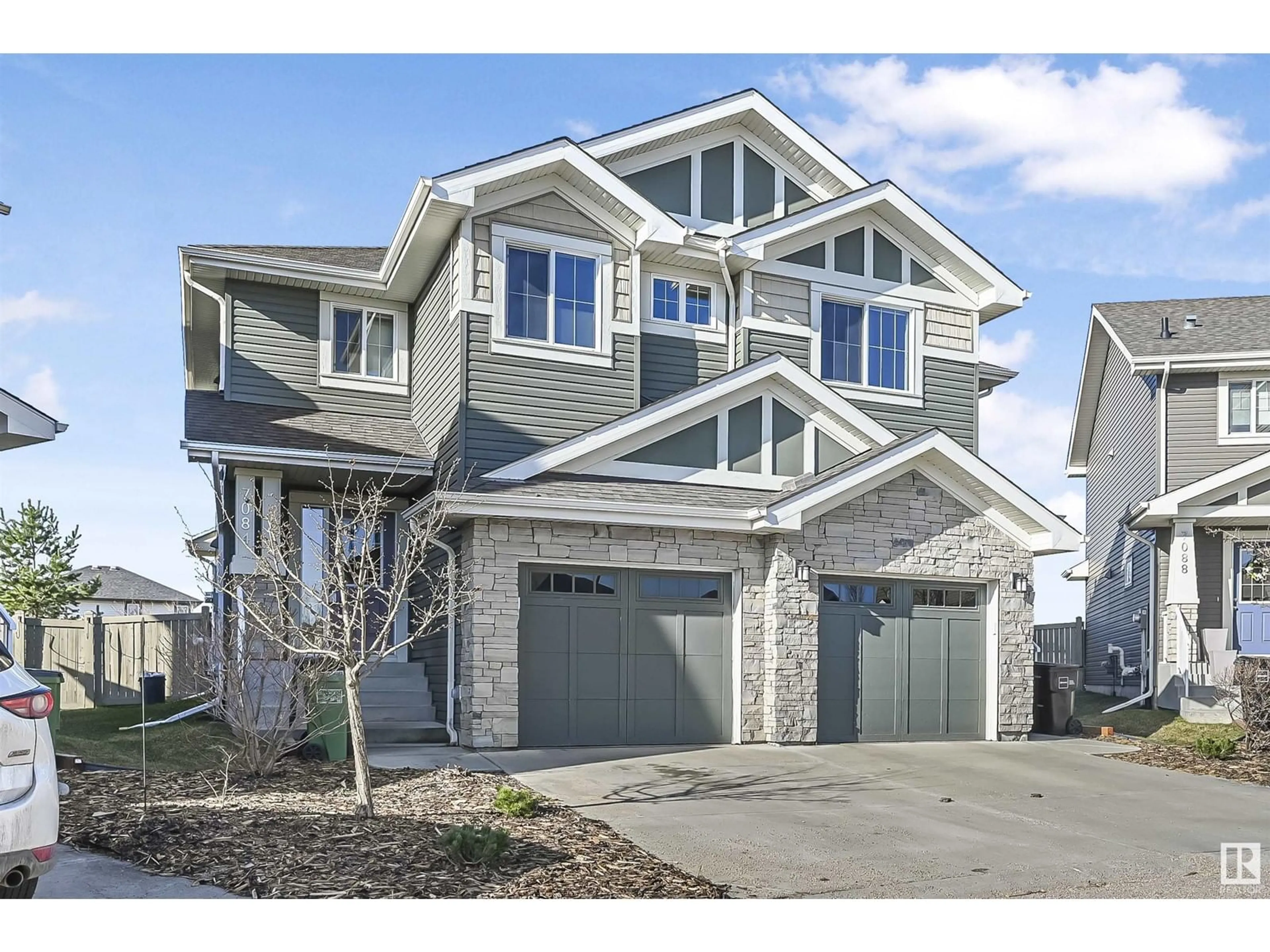 Home with vinyl exterior material, street for 7084 SOUTH TERWILLEGAR DR, Edmonton Alberta T6R0V1