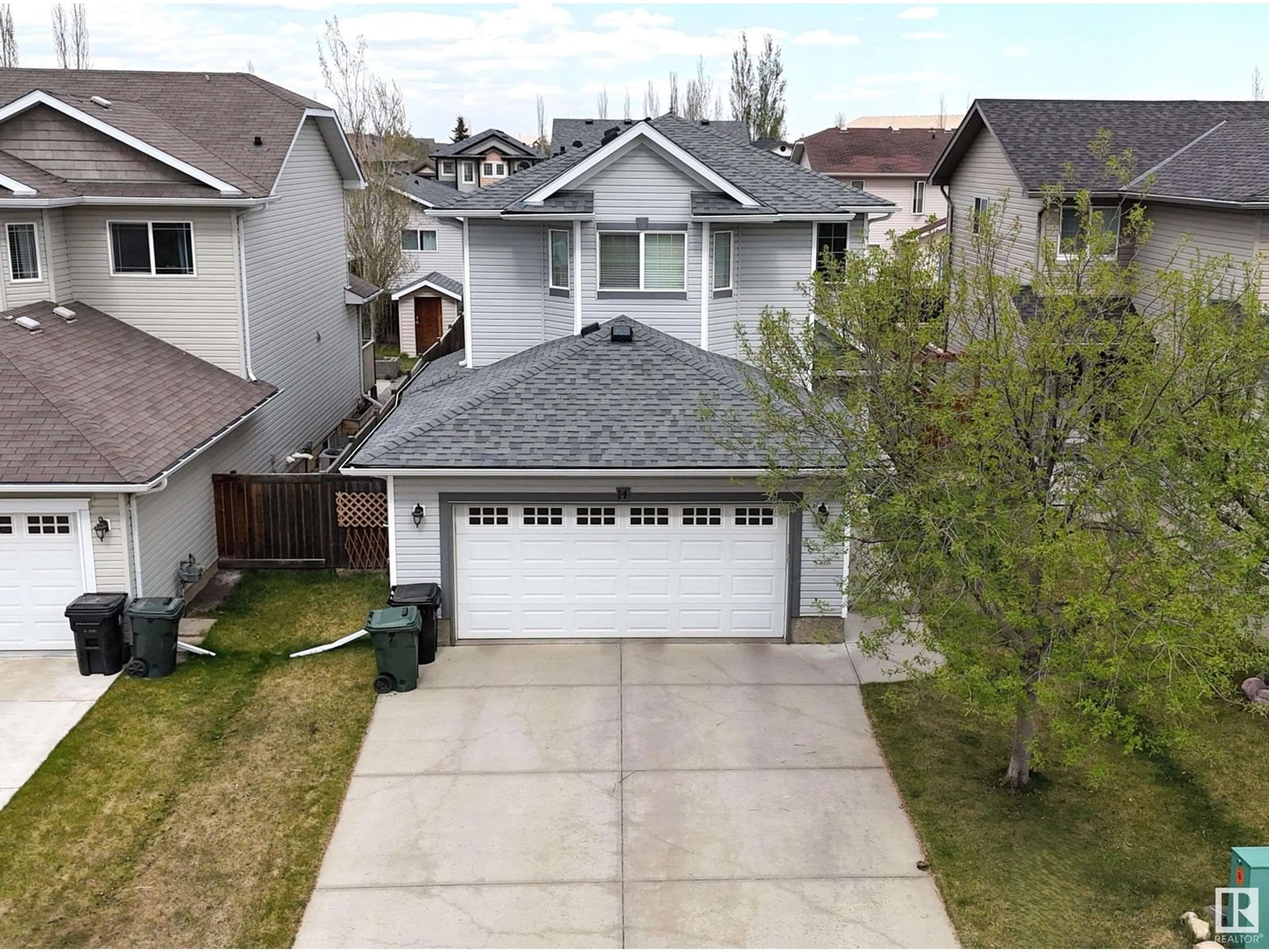 A pic from outside/outdoor area/front of a property/back of a property/a pic from drone, street for 14 SPRING GROVE CR, Spruce Grove Alberta T7X0E7