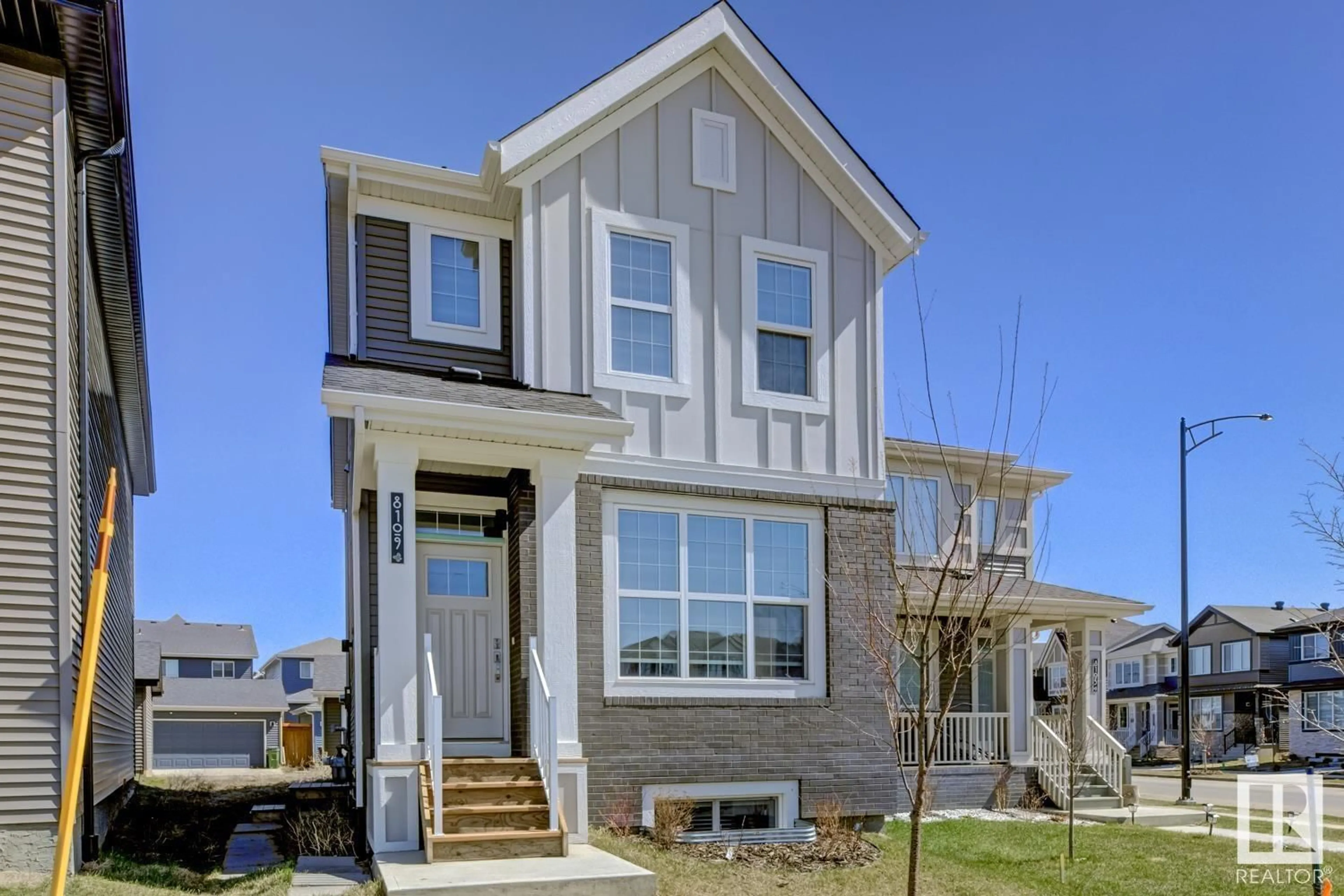 Home with vinyl exterior material, street for NW - 8109 226A ST, Edmonton Alberta T5T7S8