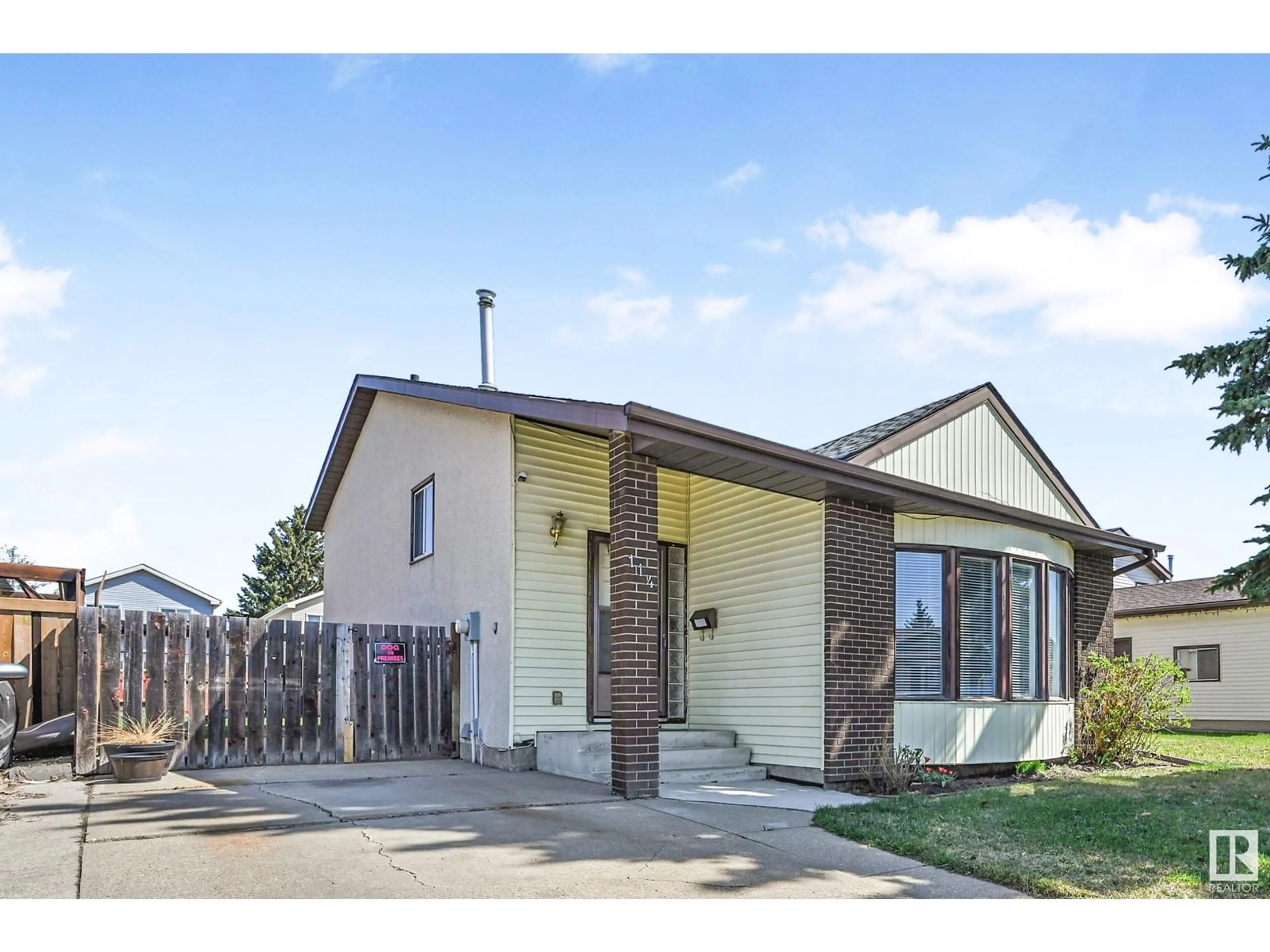 Home with brick exterior material, street for 114 KINISKI CR, Edmonton Alberta T6L5A9
