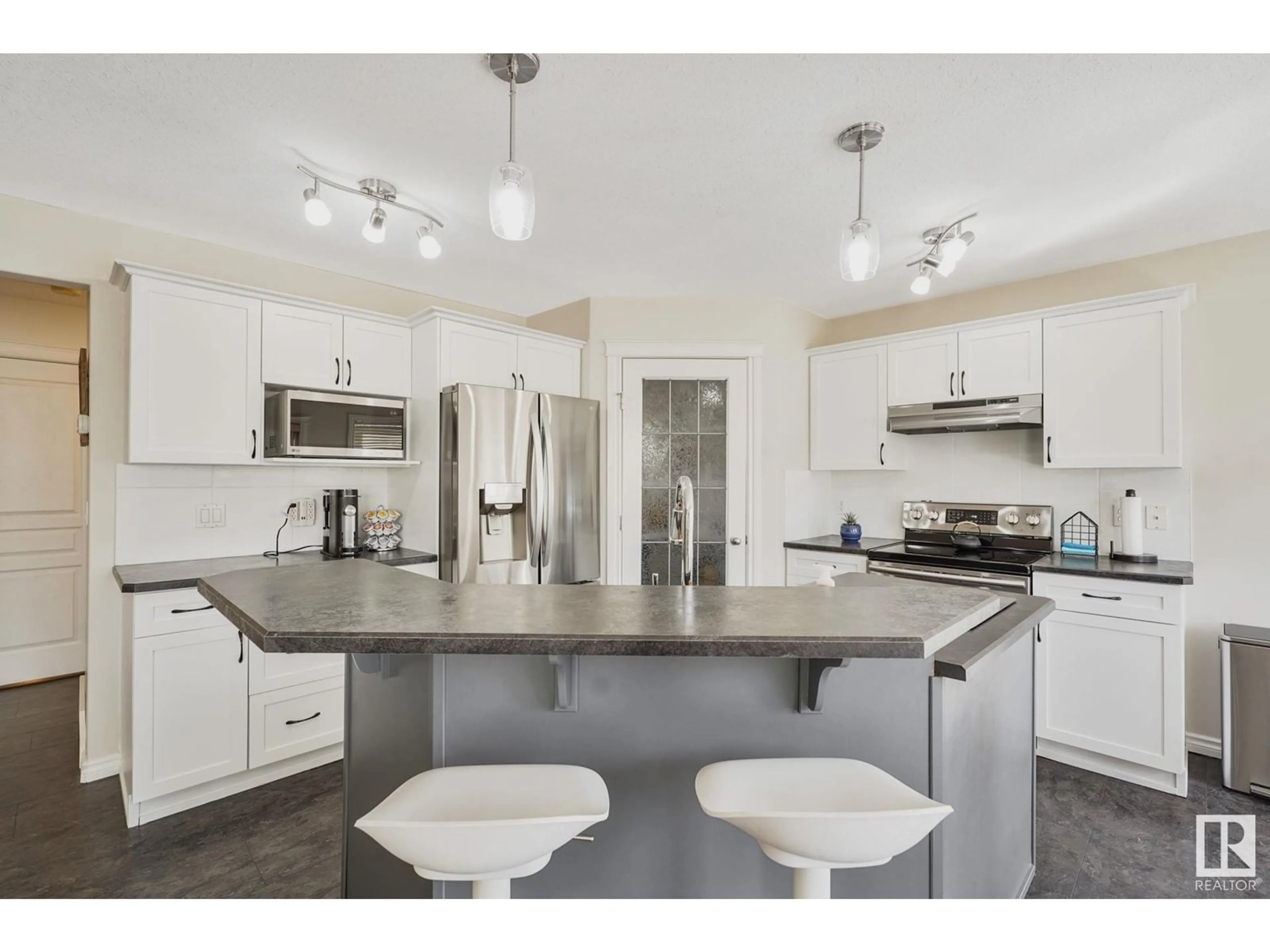 Open concept kitchen, unknown for NW - 16207 54B ST, Edmonton Alberta T5Y0E8
