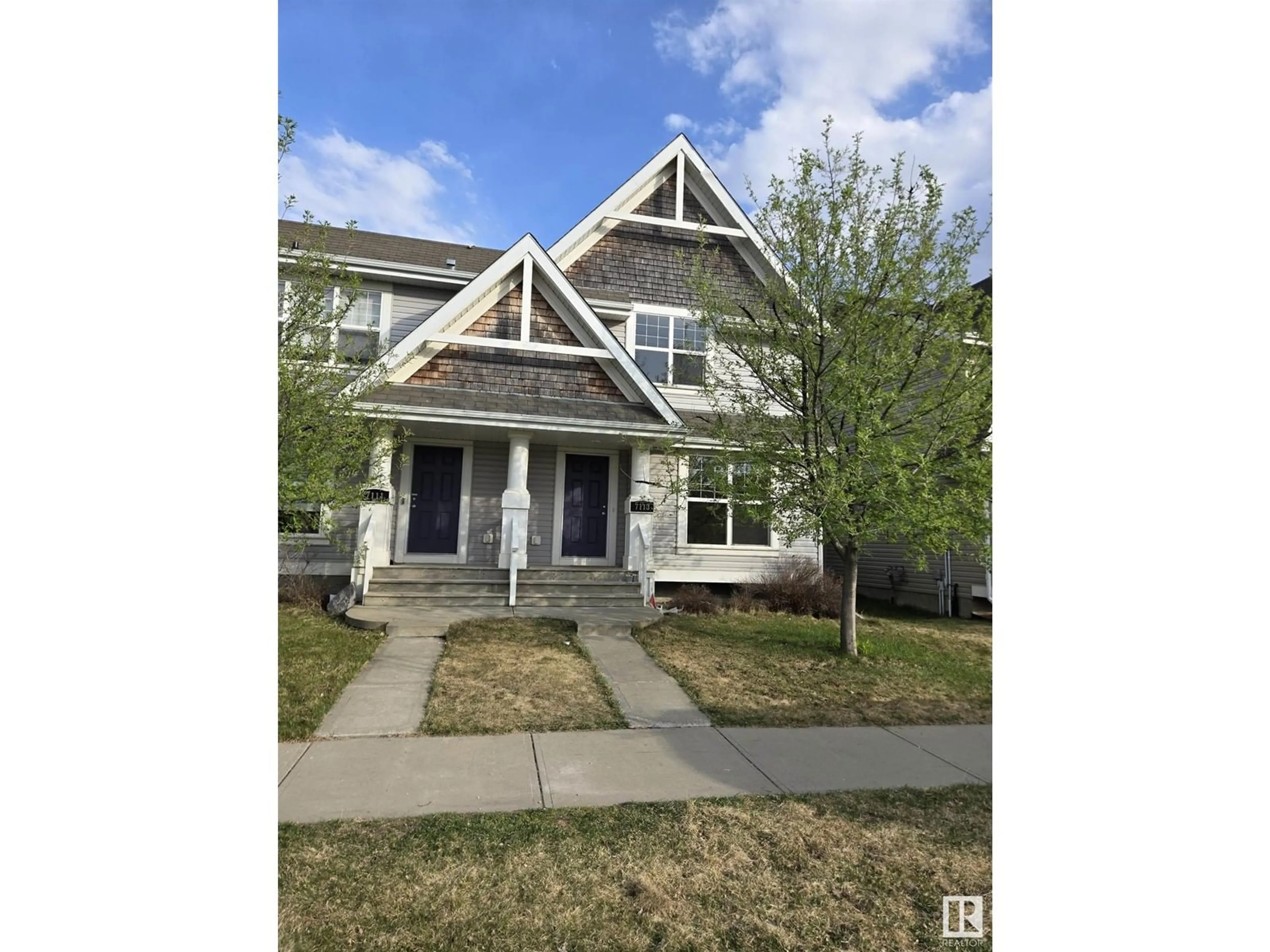 Home with vinyl exterior material, street for SW - 7113 21 AV, Edmonton Alberta T6X0L5