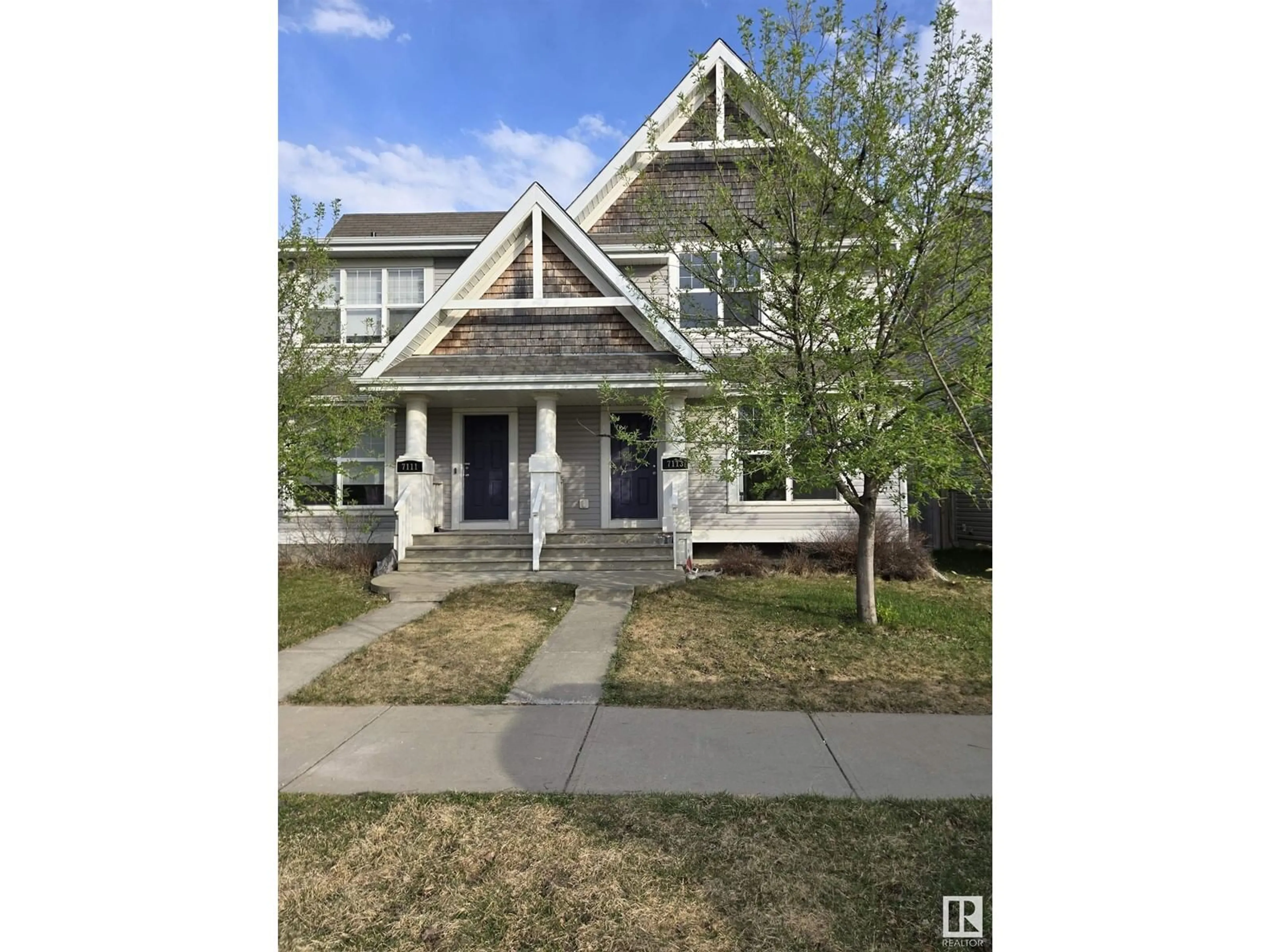 Home with vinyl exterior material, street for SW - 7113 21 AV, Edmonton Alberta T6X0L5