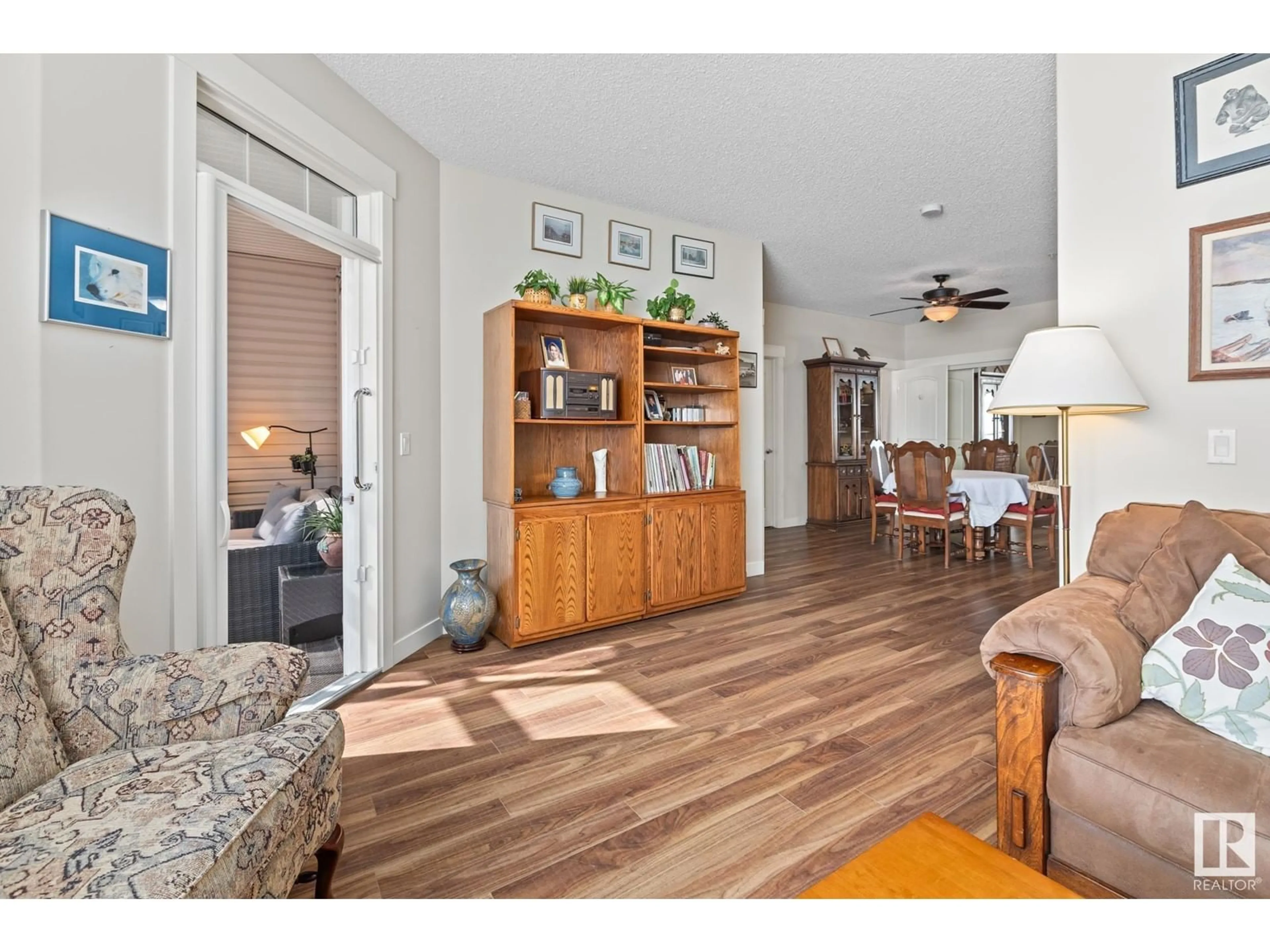 Living room with furniture, wood/laminate floor for 511 - 215 QUEEN ST, Spruce Grove Alberta T7X0G4