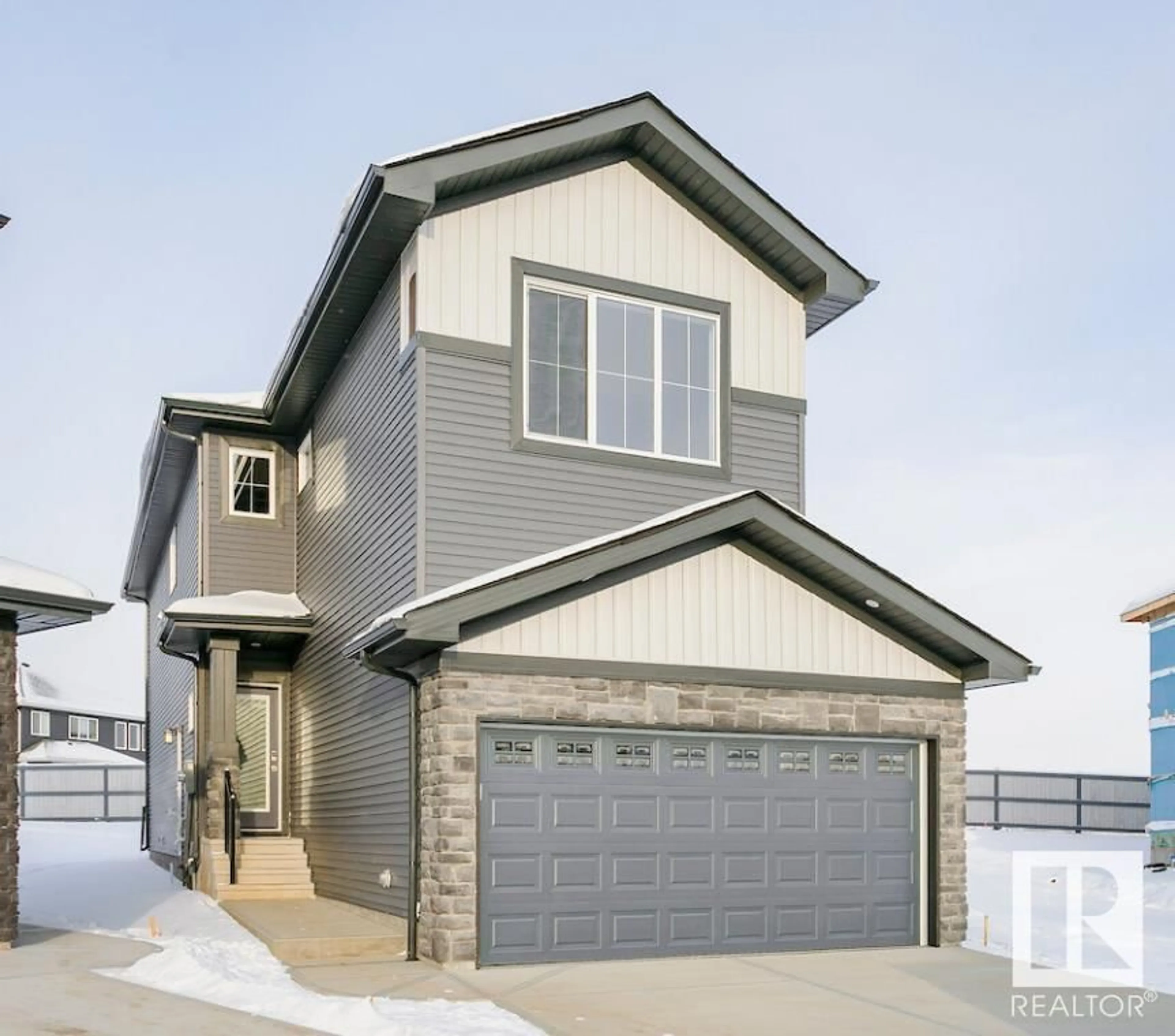 Home with vinyl exterior material, street for 2647 5 AV, Edmonton Alberta T6X3H9