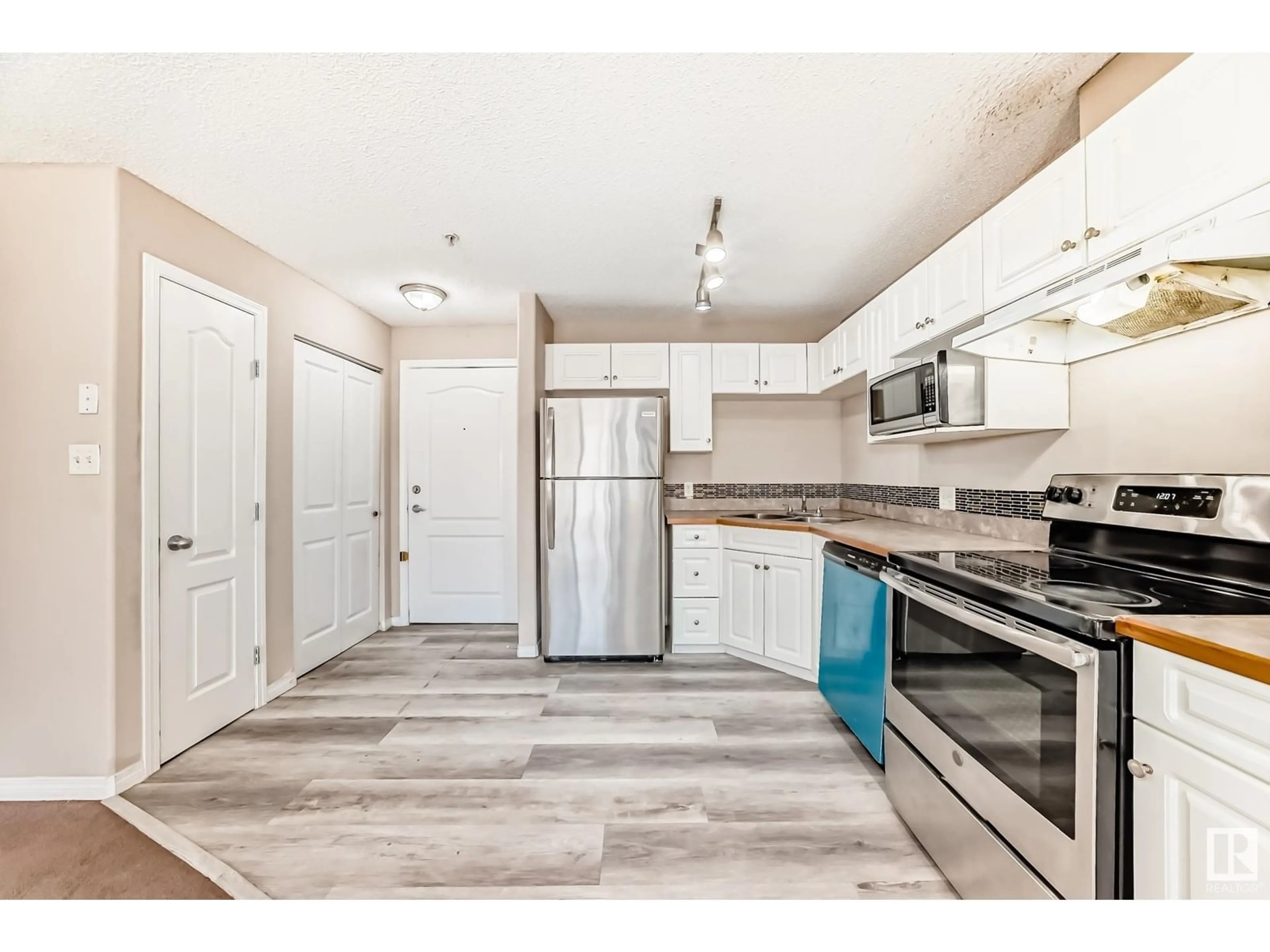 Open concept kitchen, unknown for #135 - 3425 19 ST, Edmonton Alberta T6T2B5