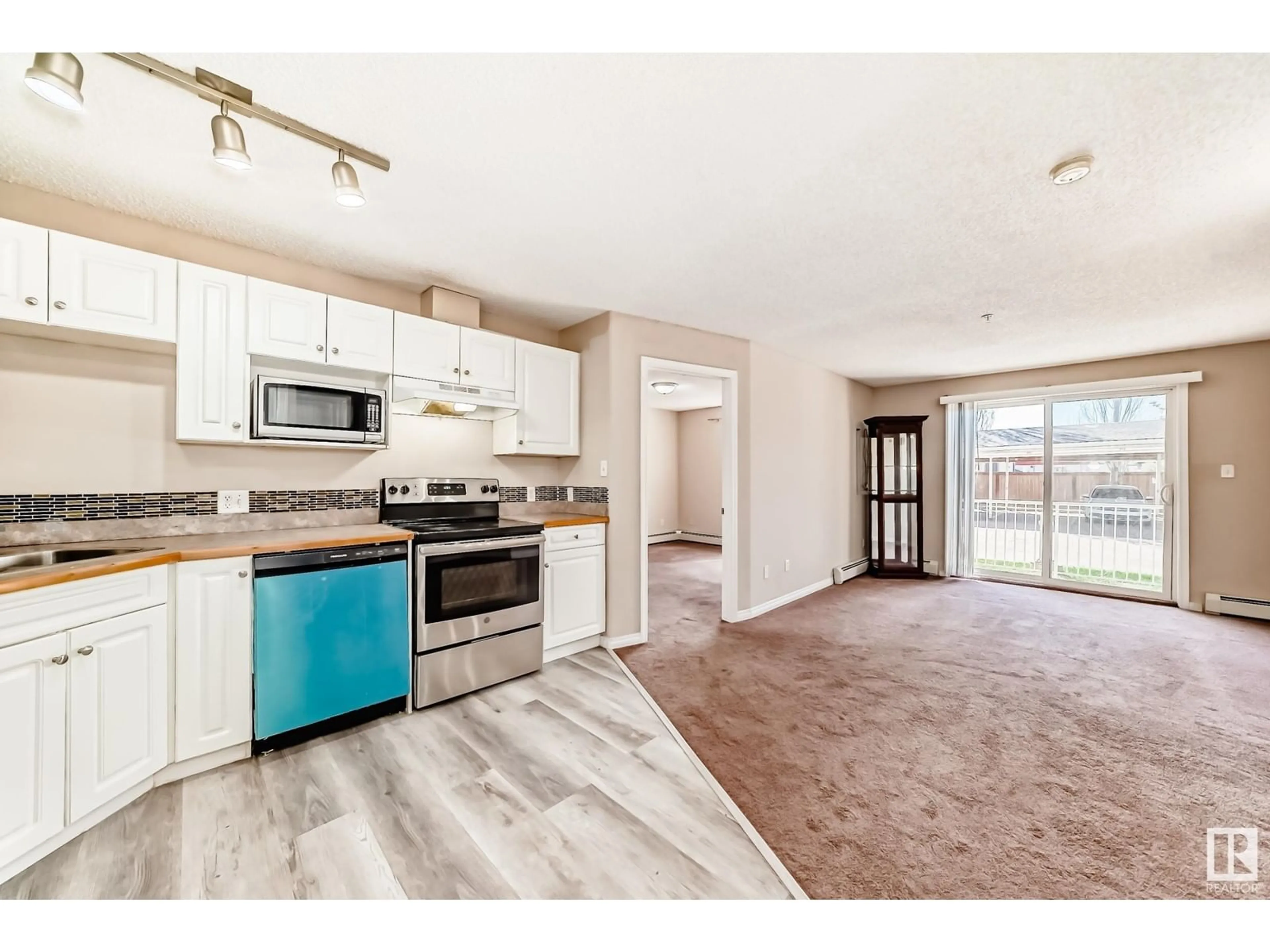 Open concept kitchen, unknown for #135 - 3425 19 ST, Edmonton Alberta T6T2B5