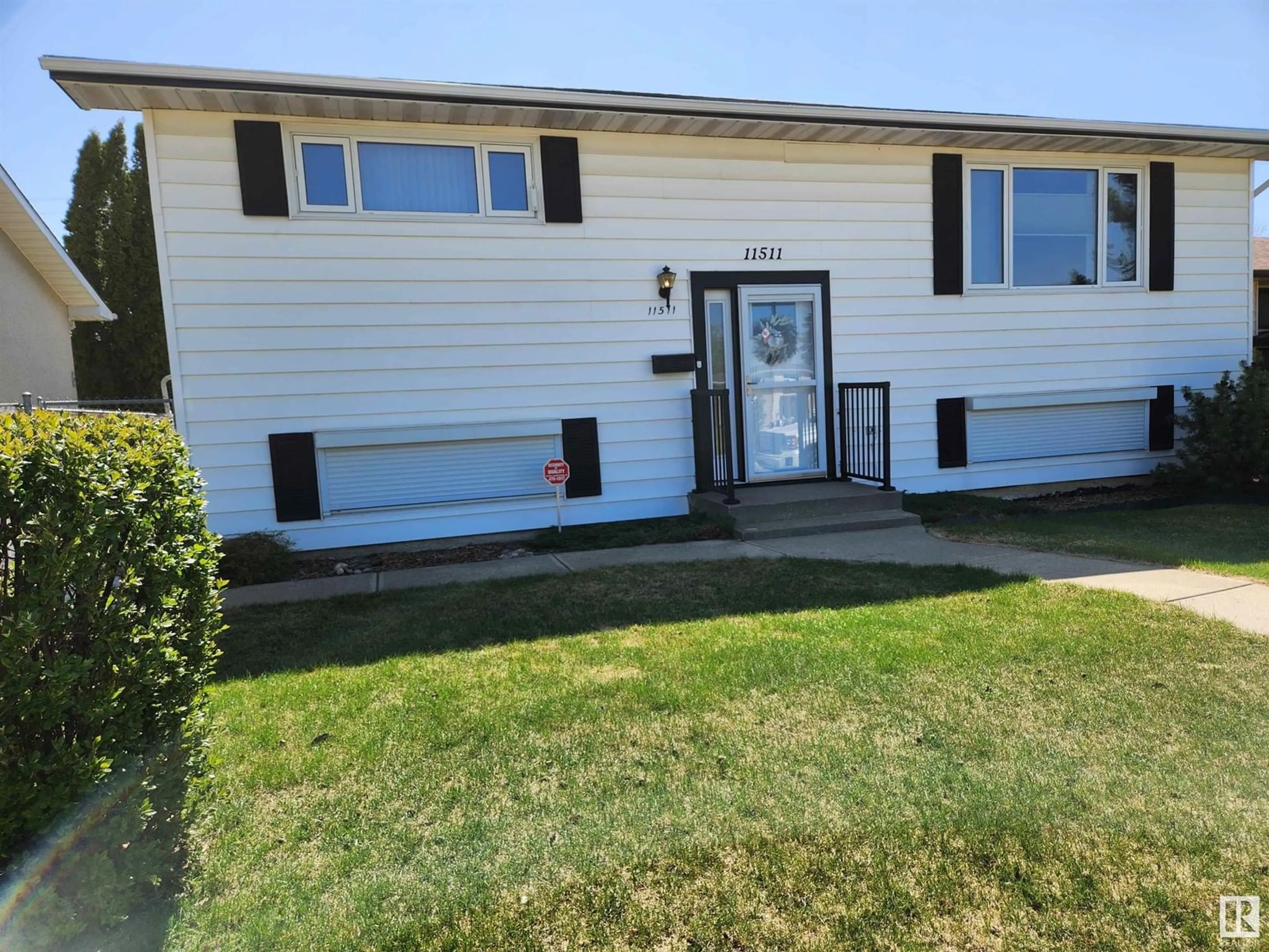 Home with vinyl exterior material, street for 11511 43 AV, Edmonton Alberta T6Y0Y6