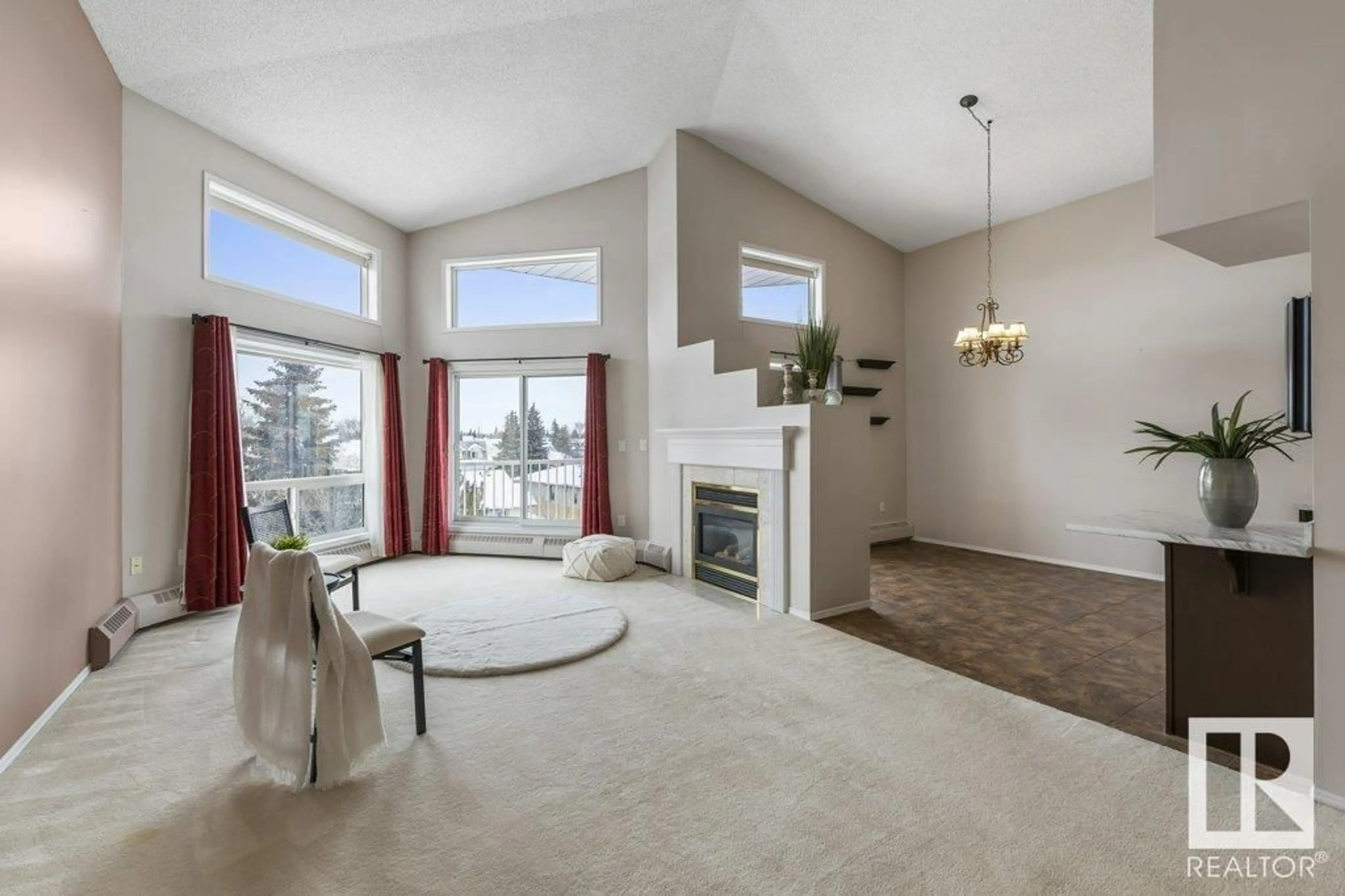 Living room with furniture, unknown for #407 - 15499 CASTLE DOWNS RD, Edmonton Alberta T5X5Y3
