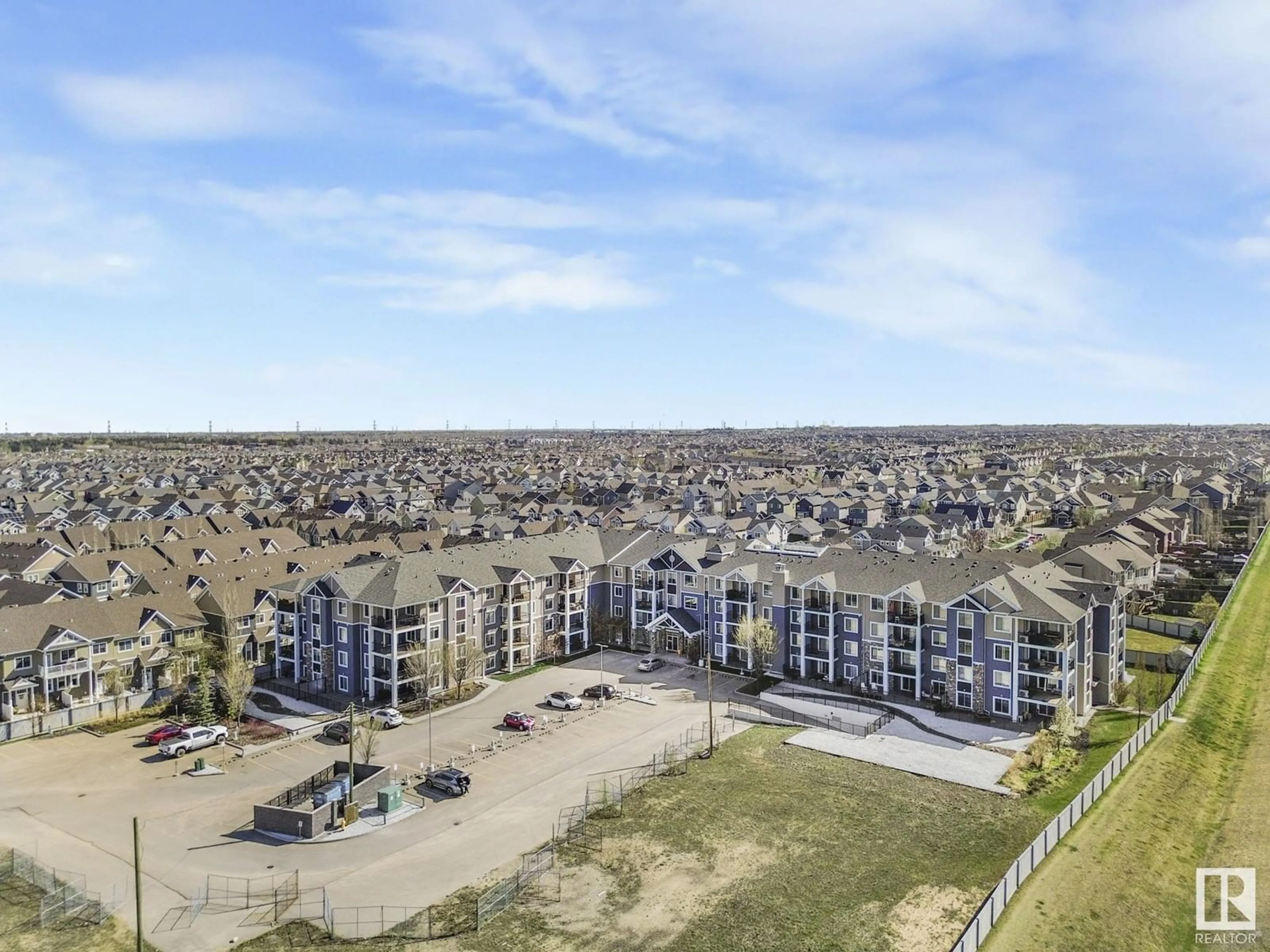 A pic from outside/outdoor area/front of a property/back of a property/a pic from drone, unknown for 4008 - 120 SAVARYN DR, Edmonton Alberta T6X2E5