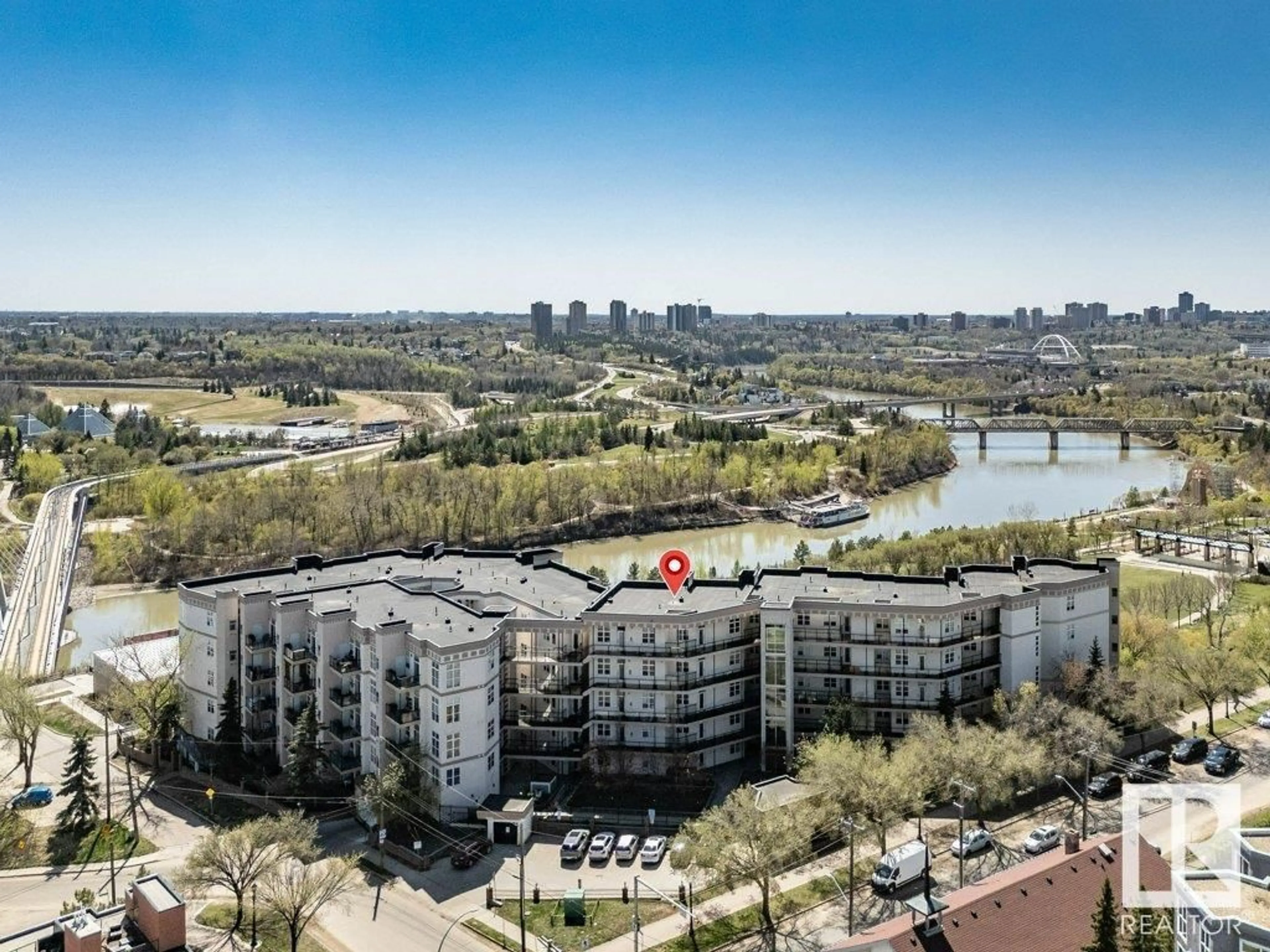 A pic from outside/outdoor area/front of a property/back of a property/a pic from drone, water/lake/river/ocean view for #214 - 9507 101 AV, Edmonton Alberta T5H4R1