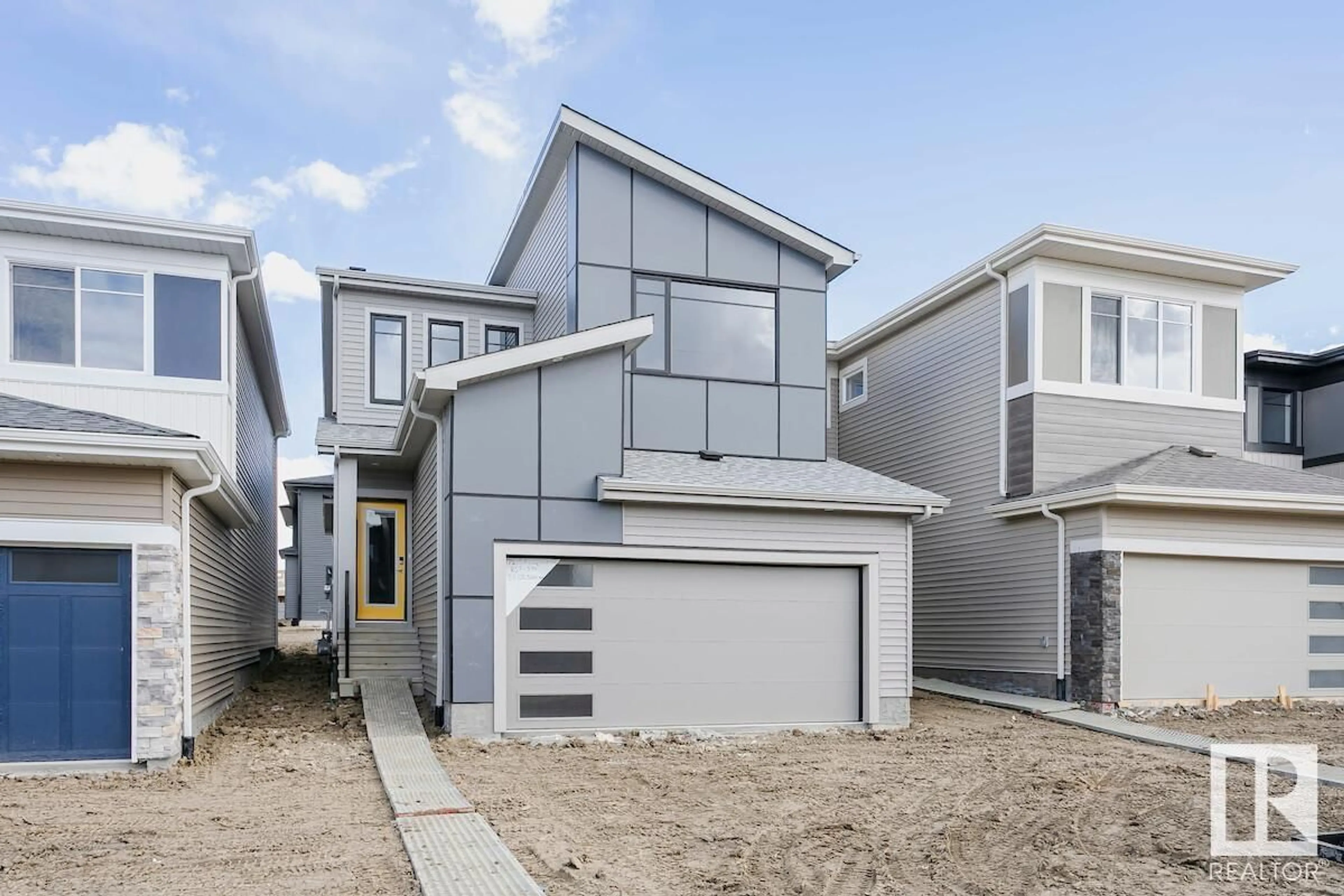 Home with vinyl exterior material, street for SW - 340 27 ST, Edmonton Alberta T6X3H9