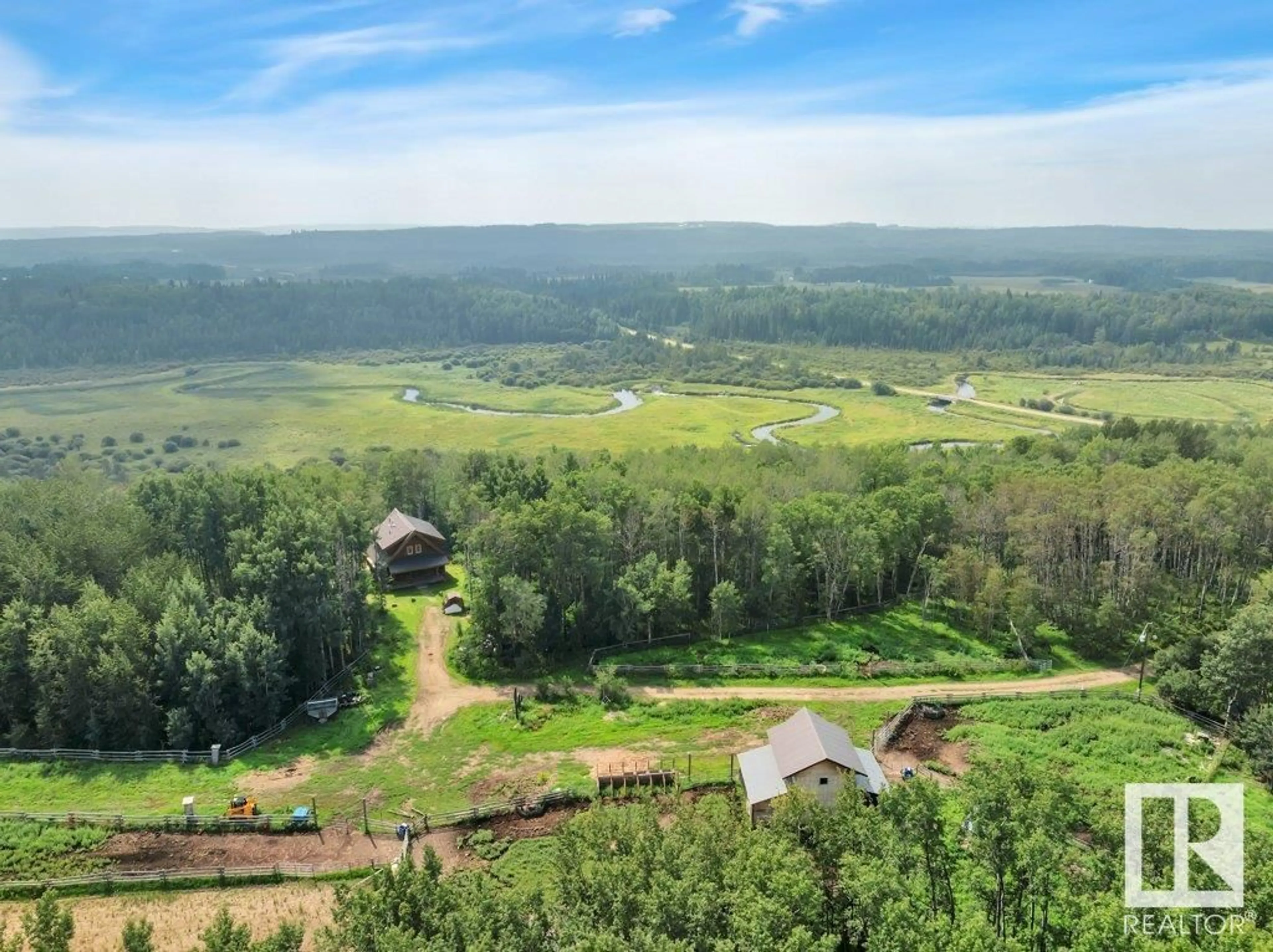 A pic from outside/outdoor area/front of a property/back of a property/a pic from drone, mountain view for 453039 RGE RD 10, Rural Wetaskiwin County Alberta T0C2V0