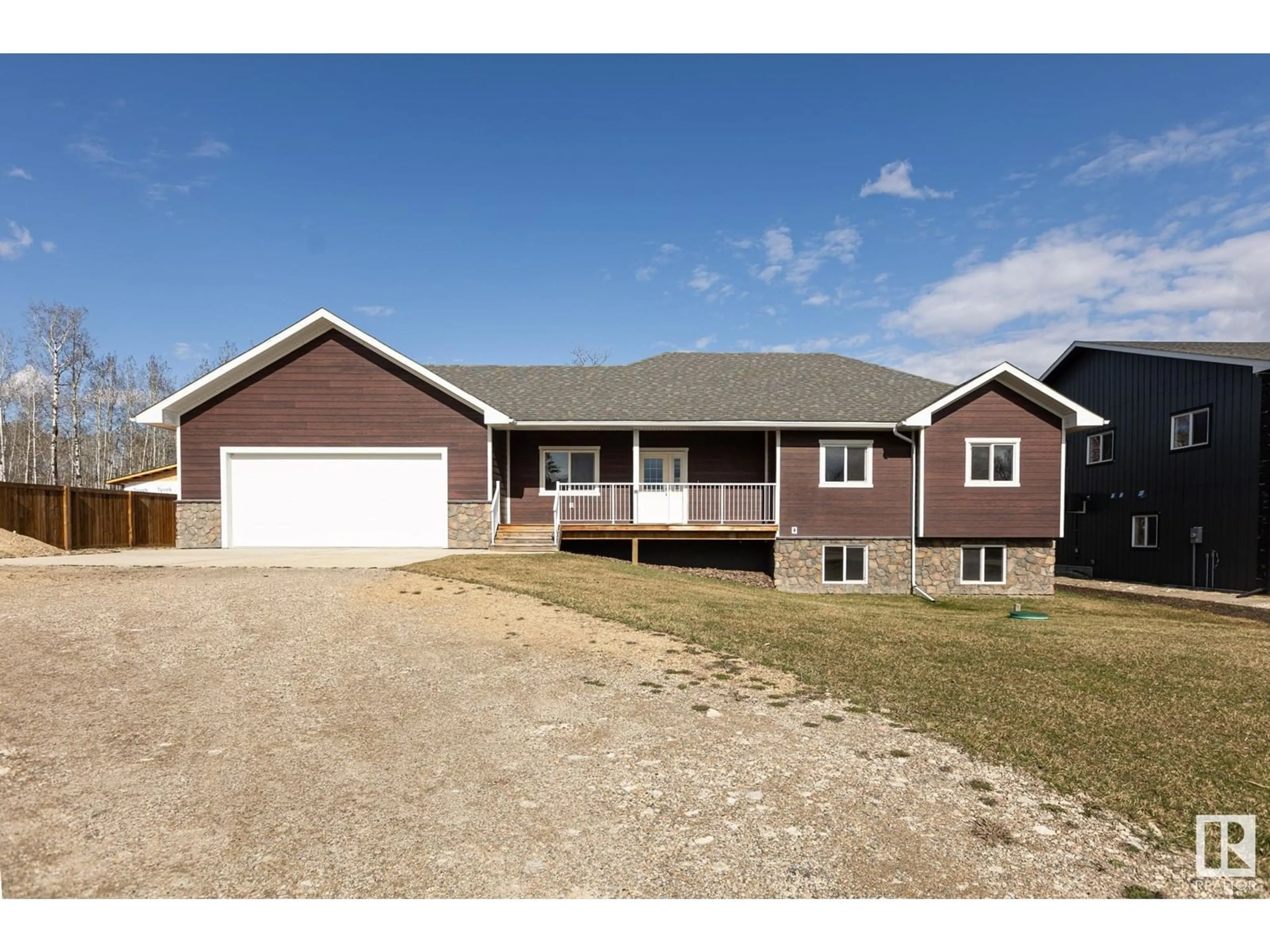 Home with vinyl exterior material, street for 404 DUNCAN, Rural Barrhead County Alberta T0E1A0