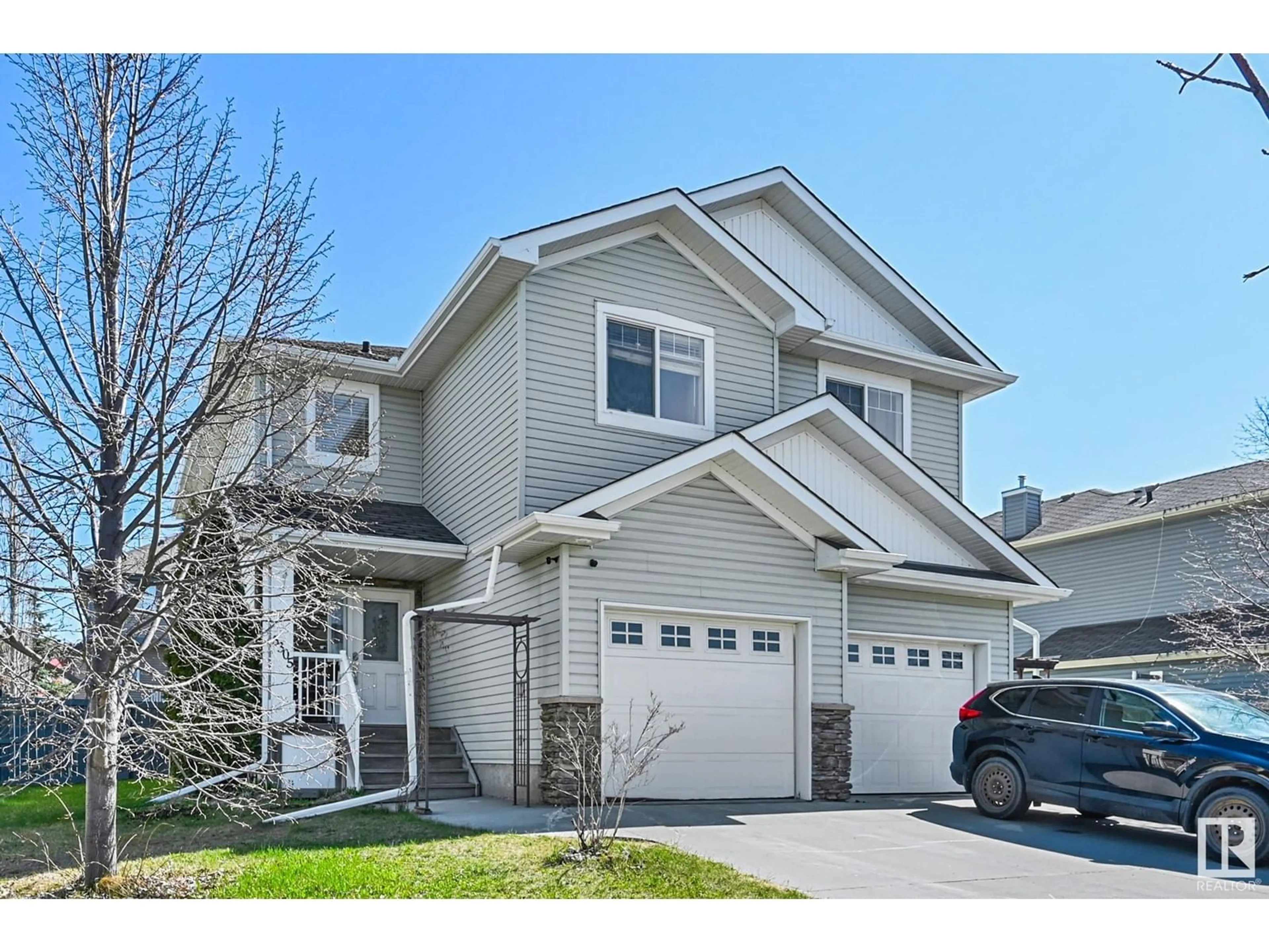 Home with vinyl exterior material, street for 5305 RUE PARC ST, Beaumont Alberta T4X1W4