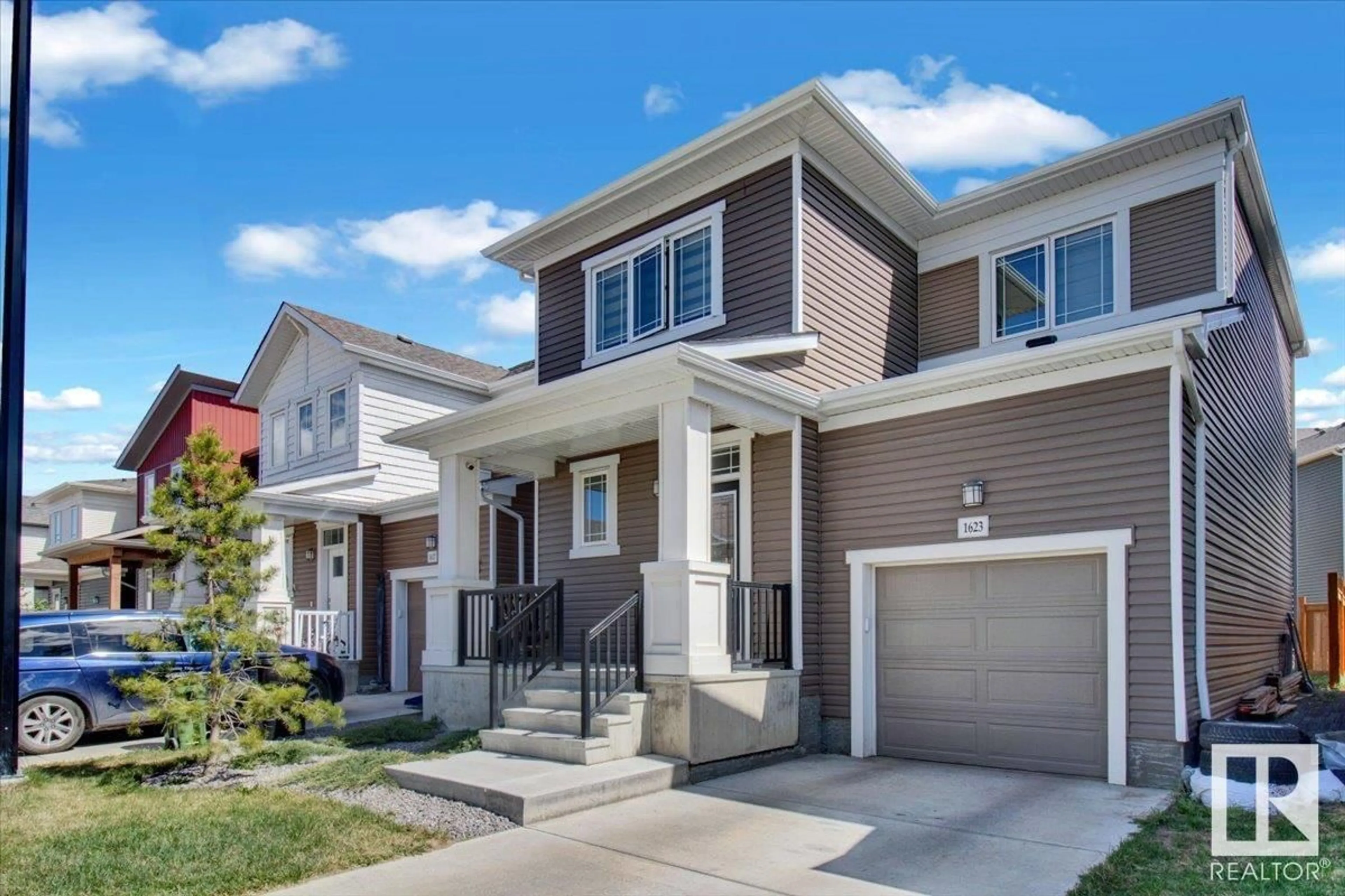 Home with brick exterior material, street for NW - 1623 203 ST, Edmonton Alberta T6M1K7