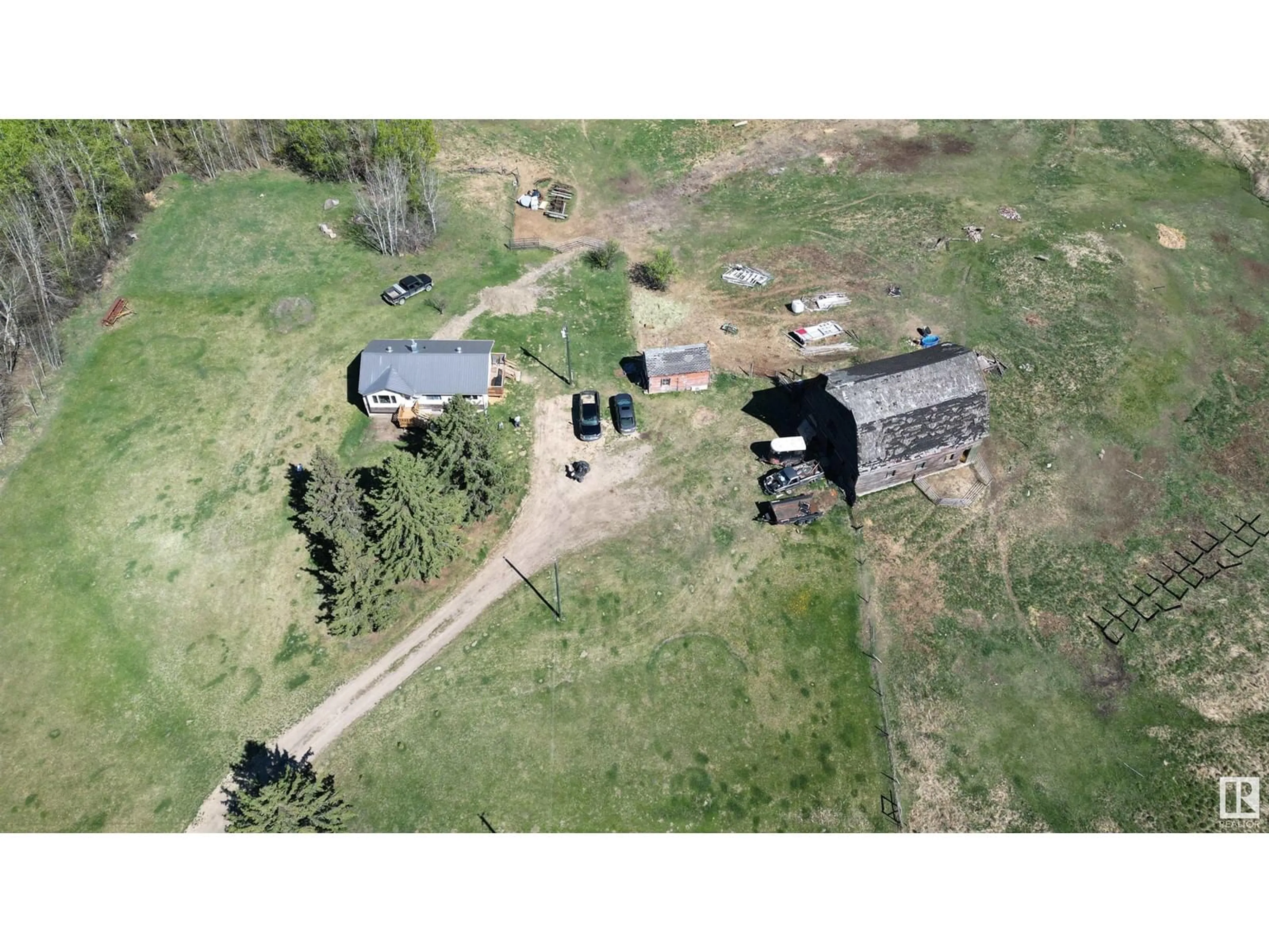 A pic from outside/outdoor area/front of a property/back of a property/a pic from drone, building for 4216 TWP RD 564, Rural Lac Ste. Anne County Alberta T0E1A0