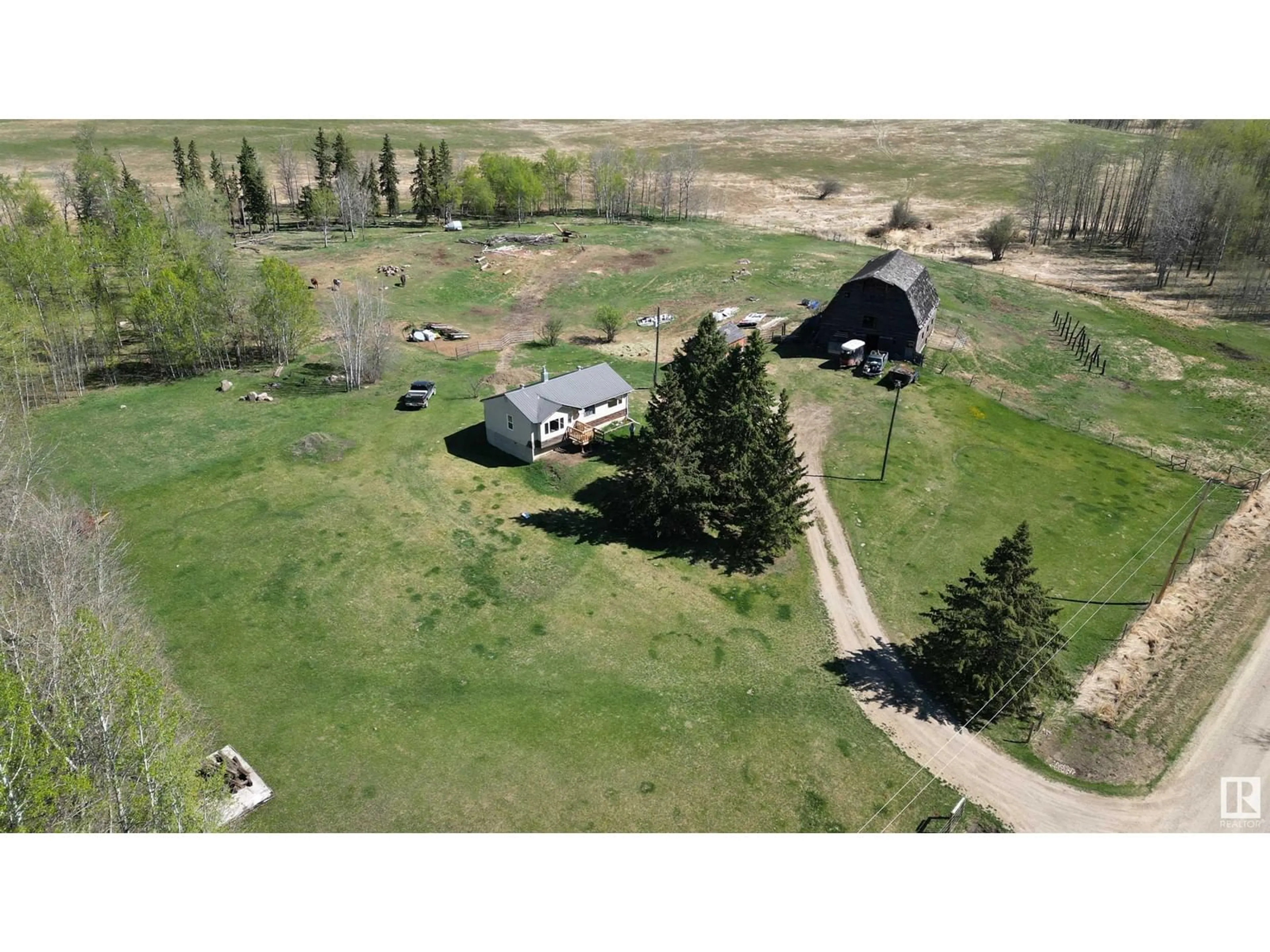 A pic from outside/outdoor area/front of a property/back of a property/a pic from drone, mountain view for 4216 TWP RD 564, Rural Lac Ste. Anne County Alberta T0E1A0