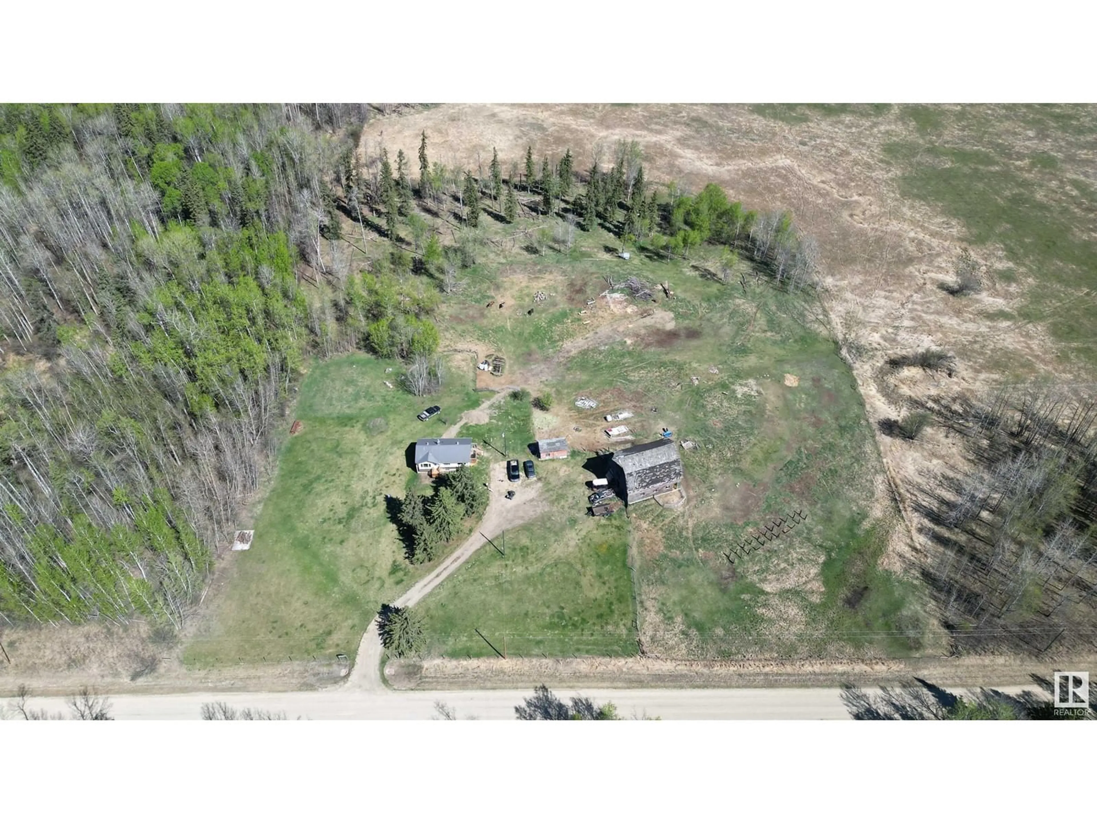 A pic from outside/outdoor area/front of a property/back of a property/a pic from drone, unknown for 4216 TWP RD 564, Rural Lac Ste. Anne County Alberta T0E1A0