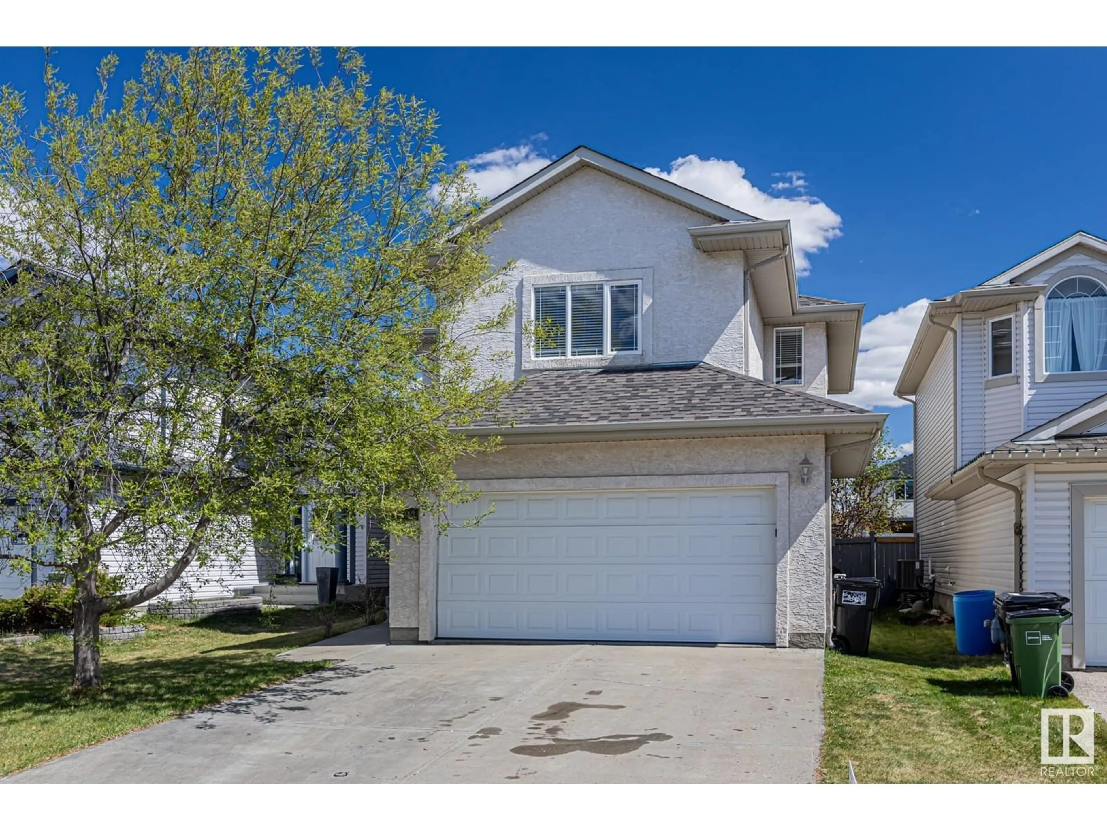 Home with vinyl exterior material, street for NW - 18213 106A ST, Edmonton Alberta T5X6G5
