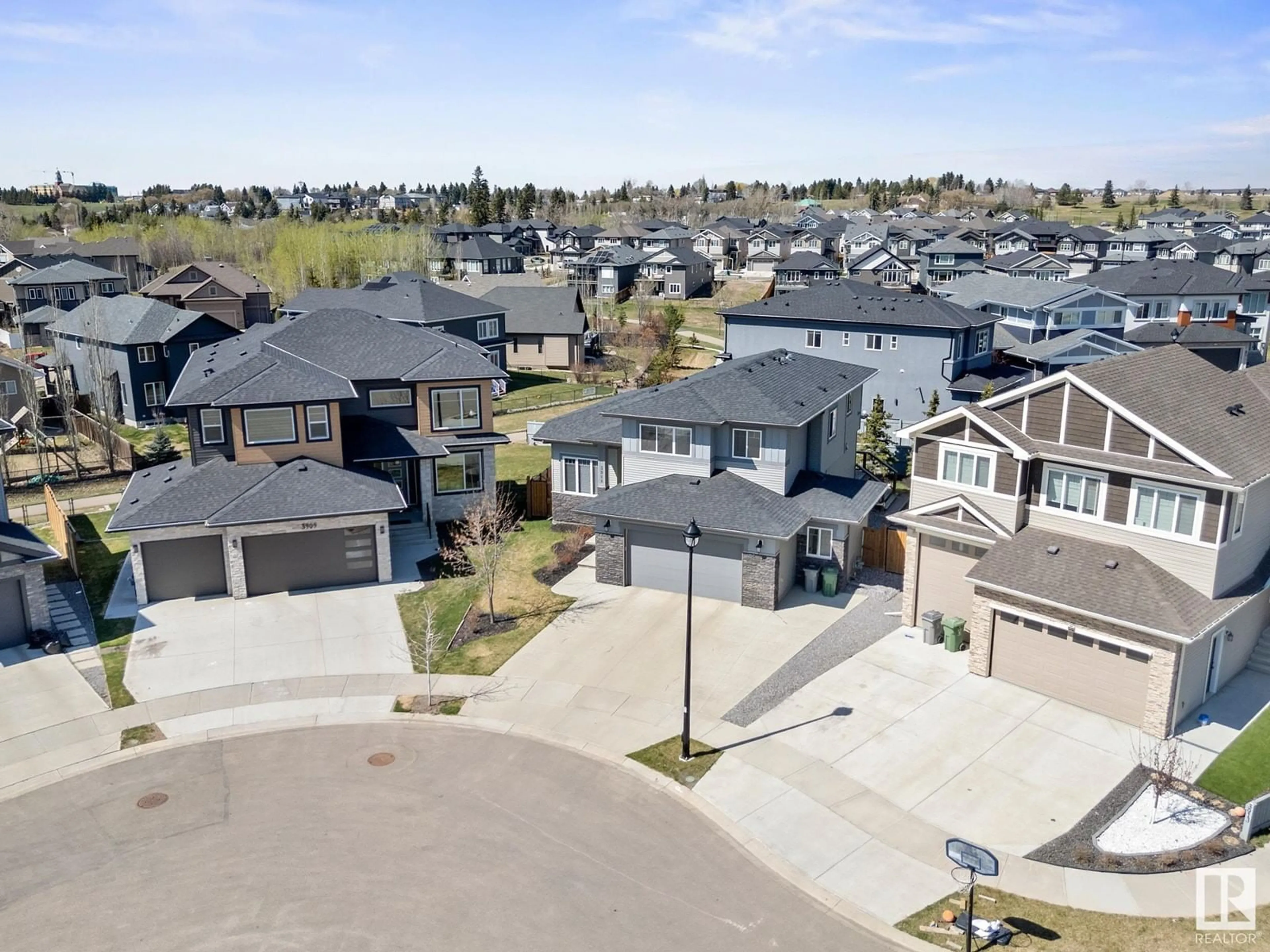A pic from outside/outdoor area/front of a property/back of a property/a pic from drone, street for 3911 44 AV, Beaumont Alberta T4X2B7