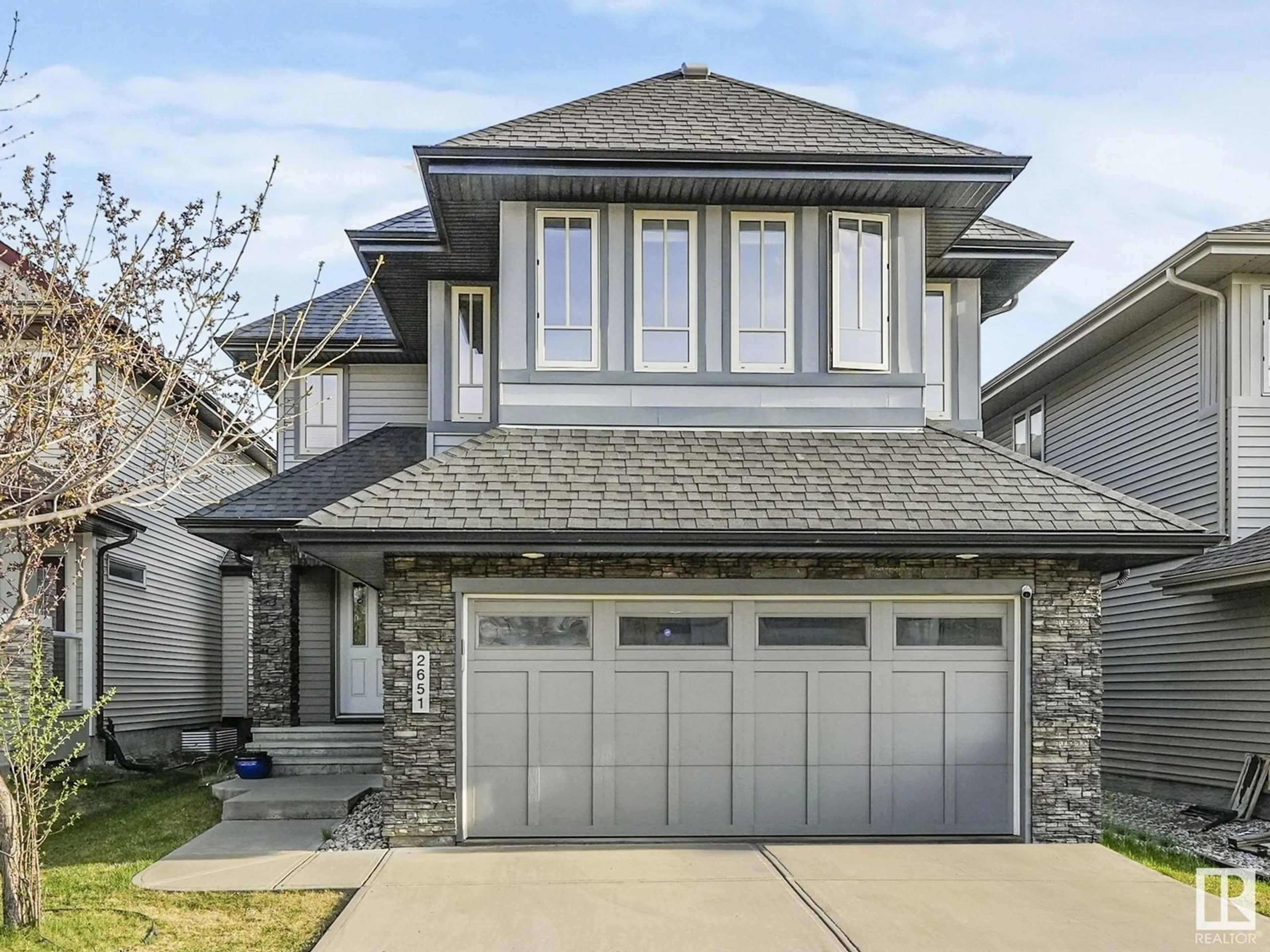 Home with vinyl exterior material, street for 2651 ANDERSON CR, Edmonton Alberta T6W0K7