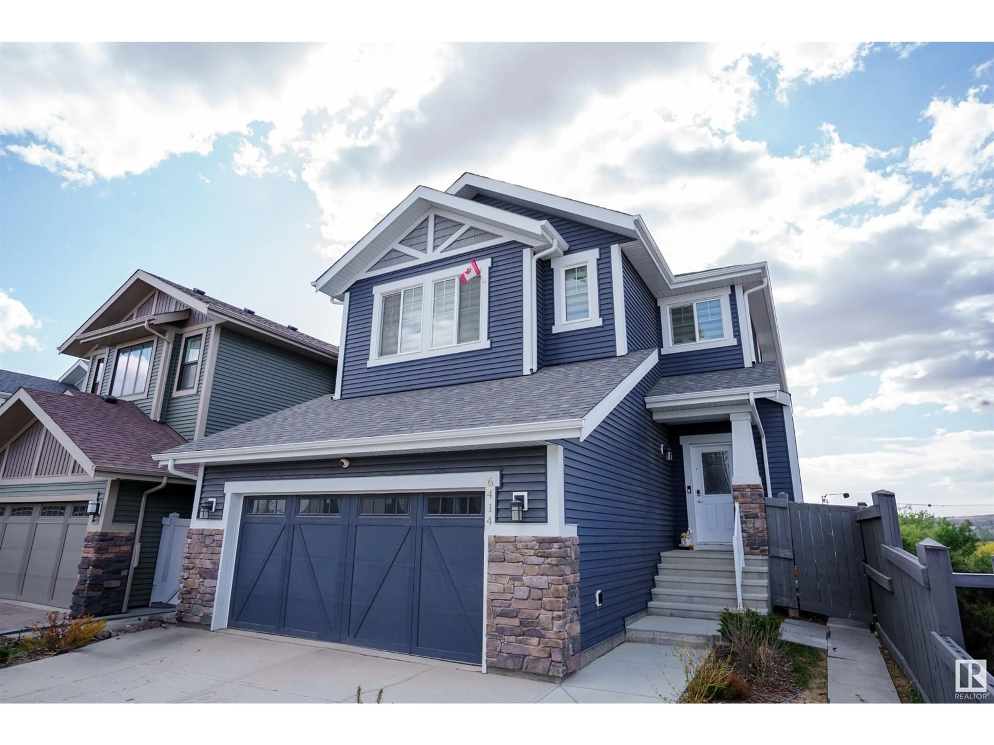 Home with vinyl exterior material, street for 6414 LAUBMAN STREET, Edmonton Alberta T5E6Y6