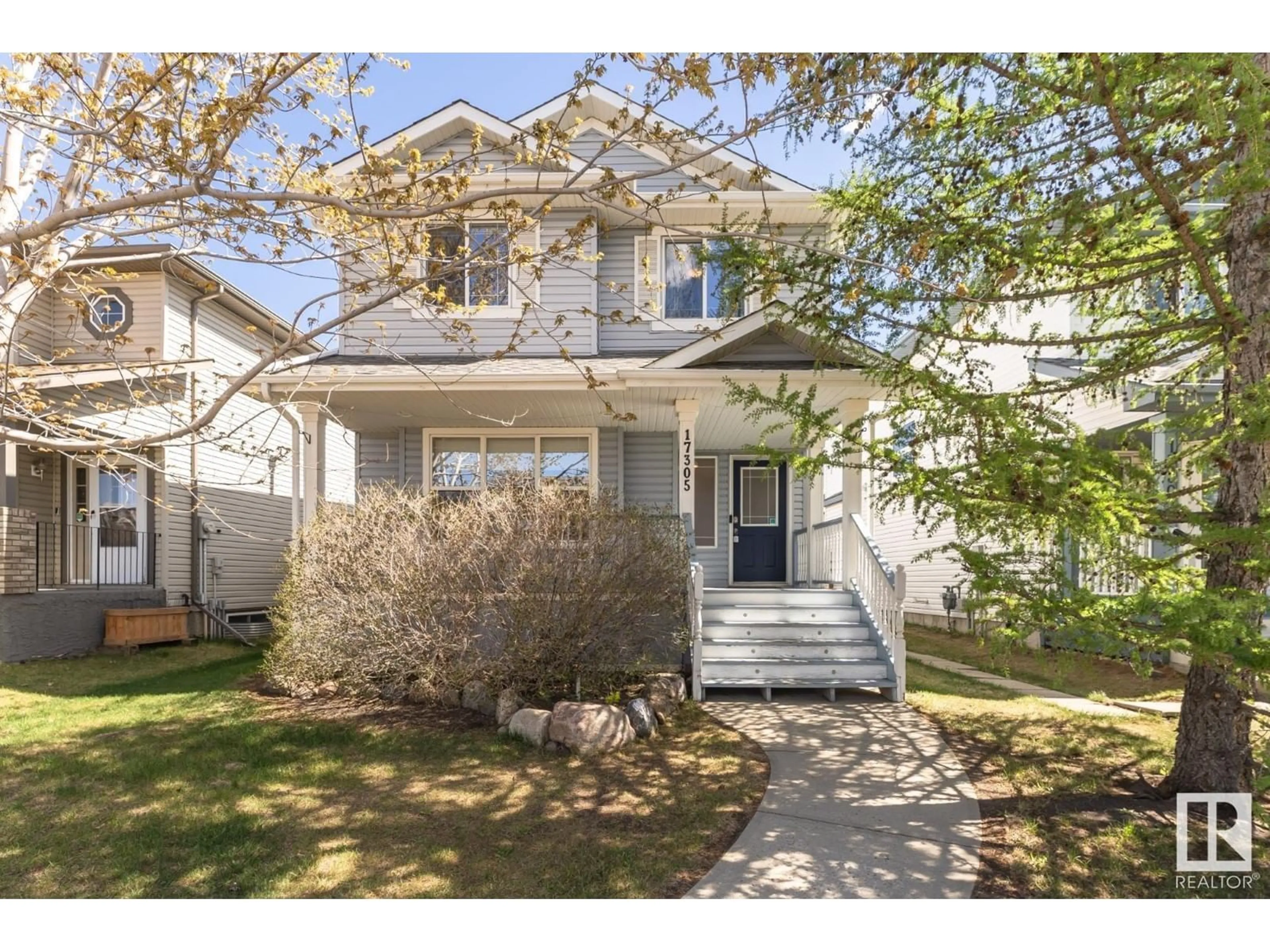 Home with vinyl exterior material, street for 17305 88 ST, Edmonton Alberta T5Z3R4