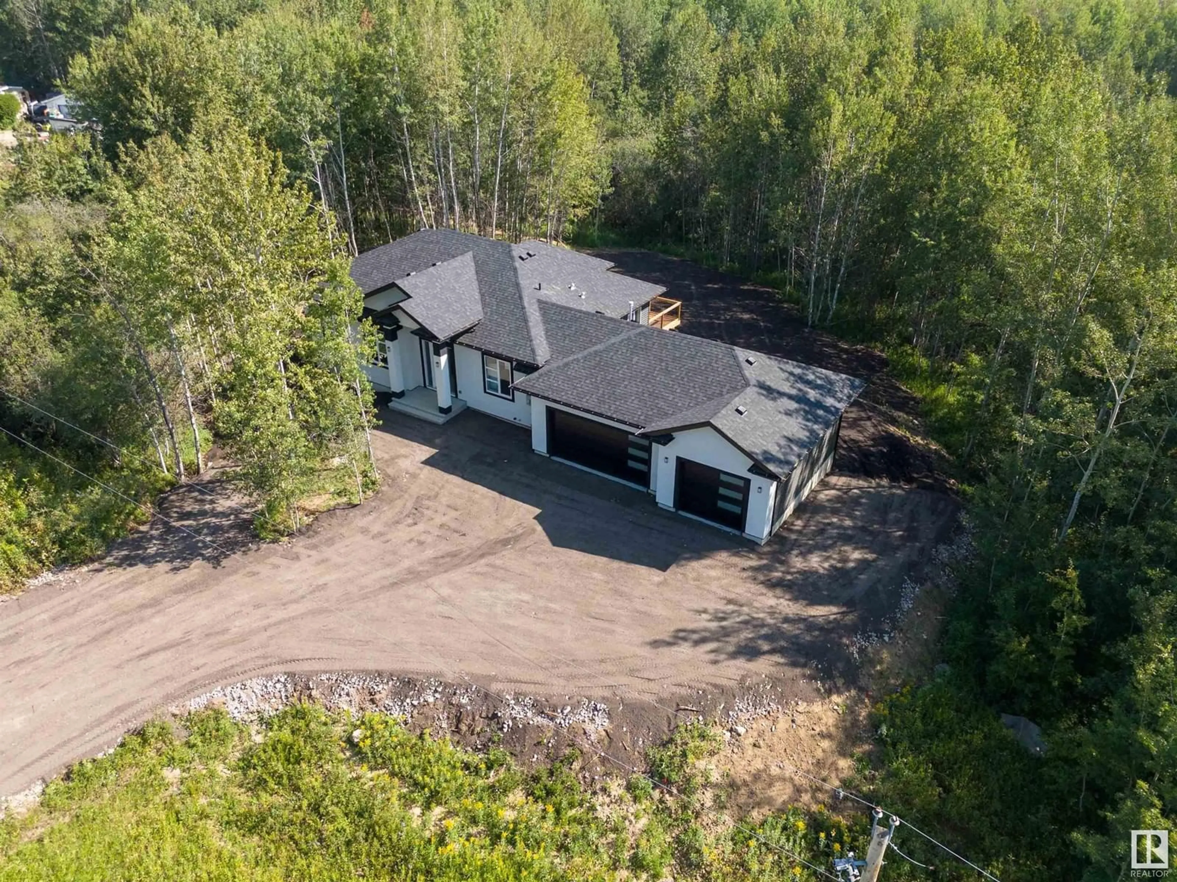 A pic from outside/outdoor area/front of a property/back of a property/a pic from drone, forest/trees view for 50419 - 353 RANGE ROAD 203, Rural Beaver County Alberta T0B4J2
