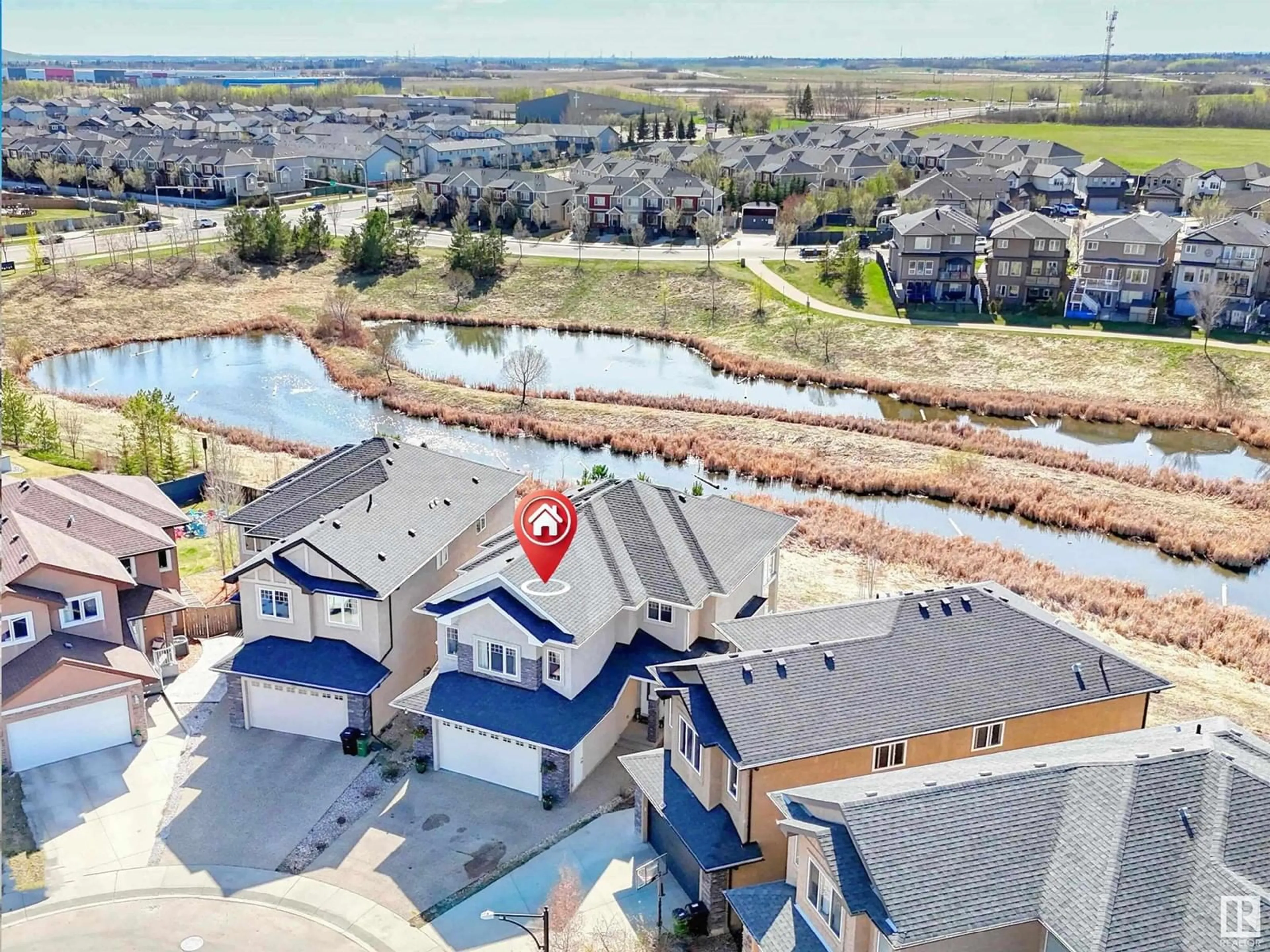 A pic from outside/outdoor area/front of a property/back of a property/a pic from drone, water/lake/river/ocean view for 725 ALBANY PL, Edmonton Alberta T6V0H9