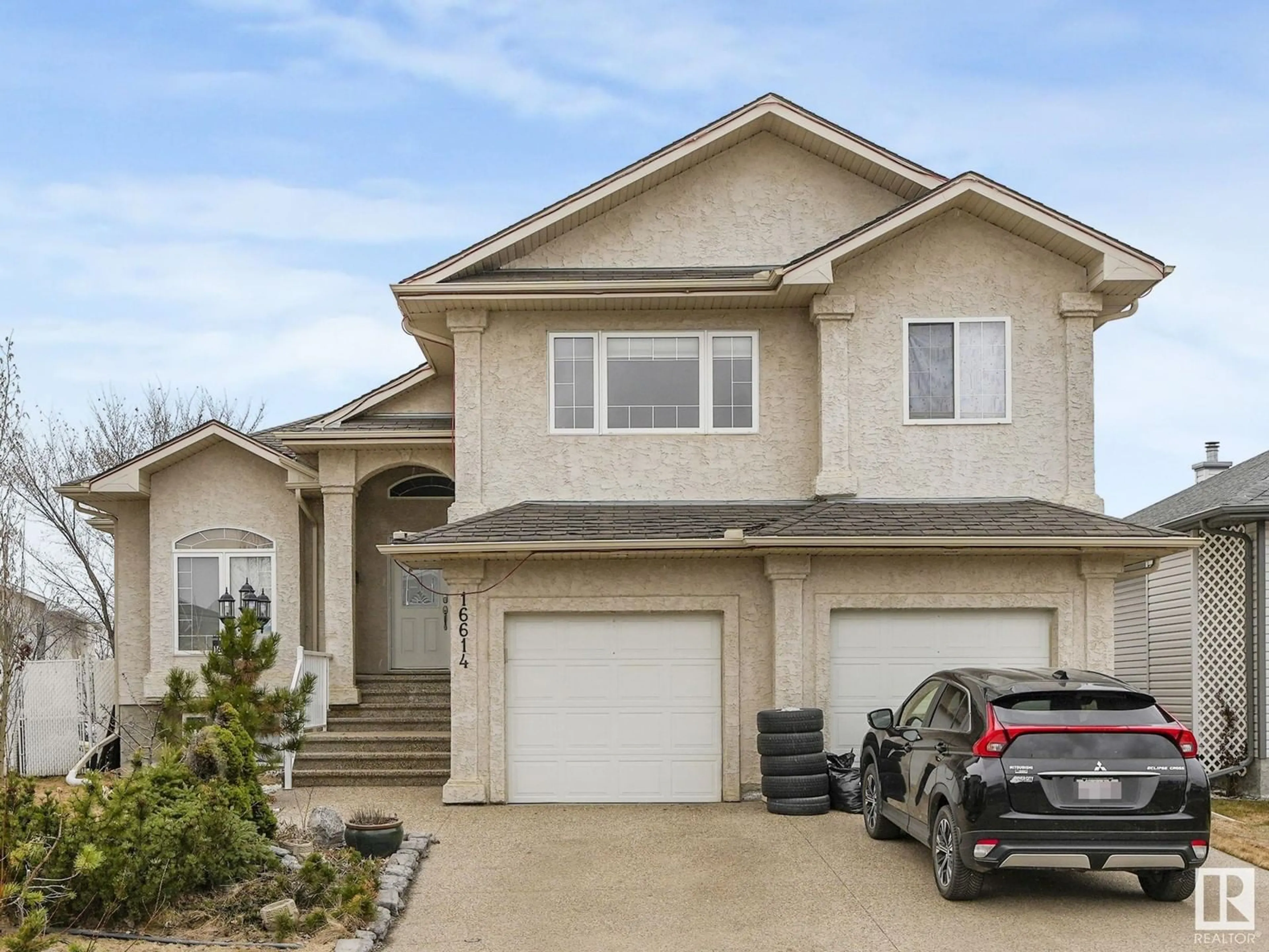 Home with vinyl exterior material, street for NW - 16614 75A ST, Edmonton Alberta T5Z3W2