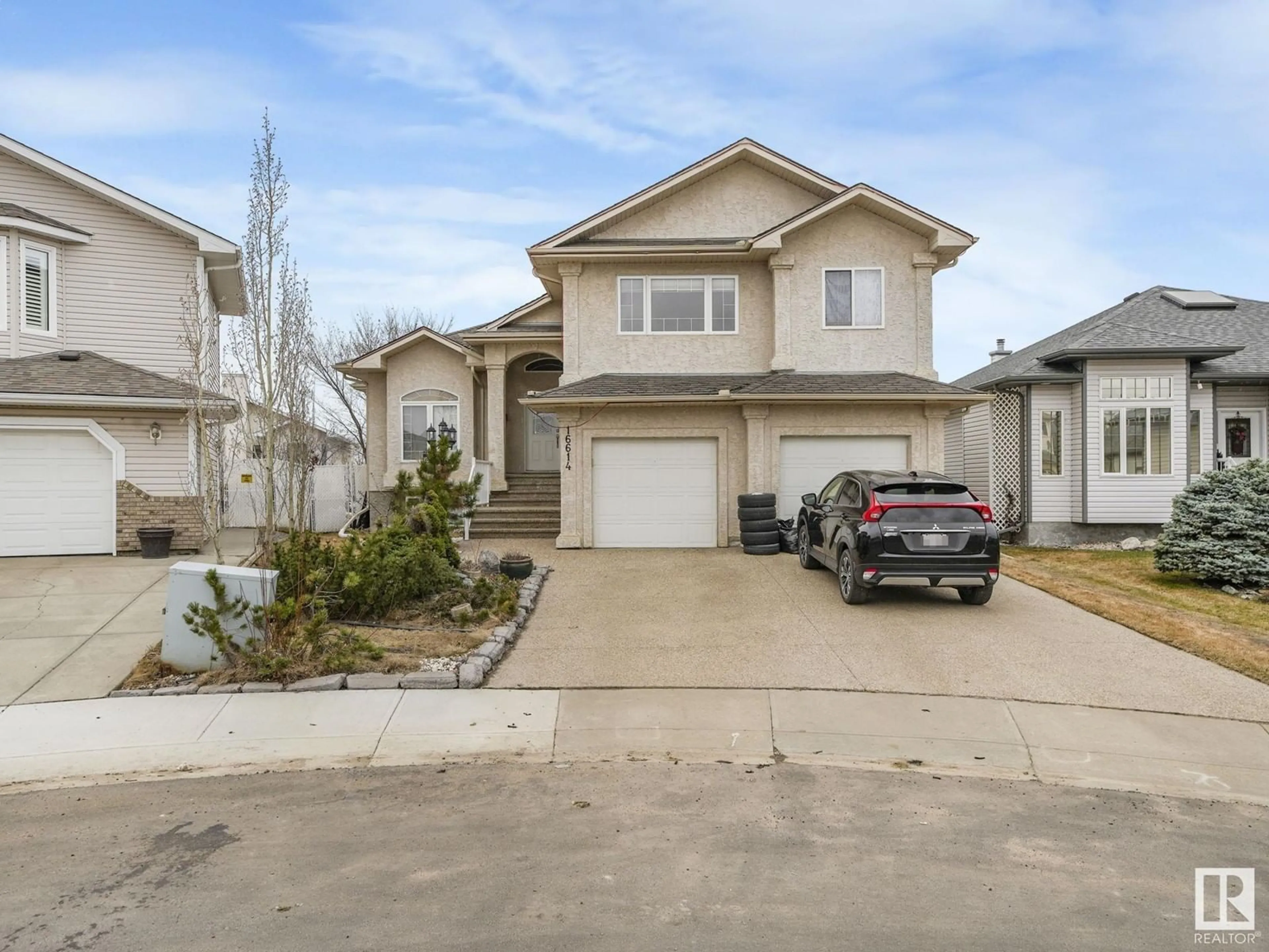 Home with vinyl exterior material, street for NW - 16614 75A ST, Edmonton Alberta T5Z3W2