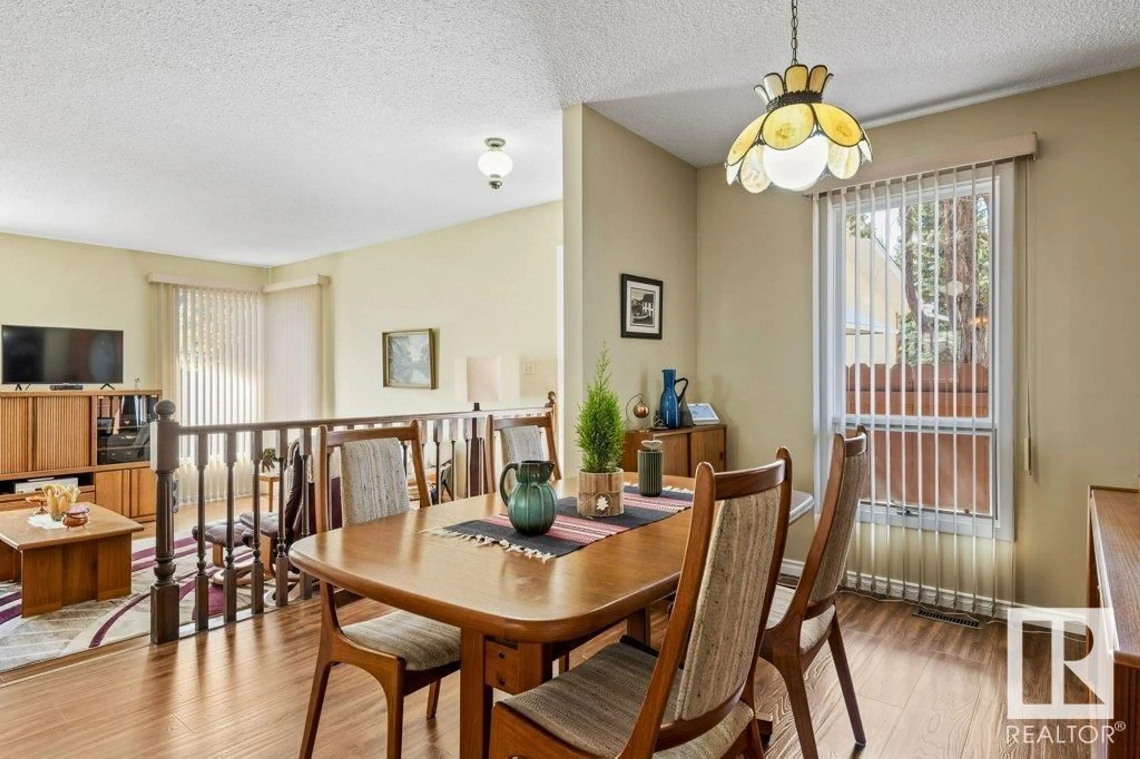 Dining room, wood/laminate floor for 4668 16A AV, Edmonton Alberta T6L2S2