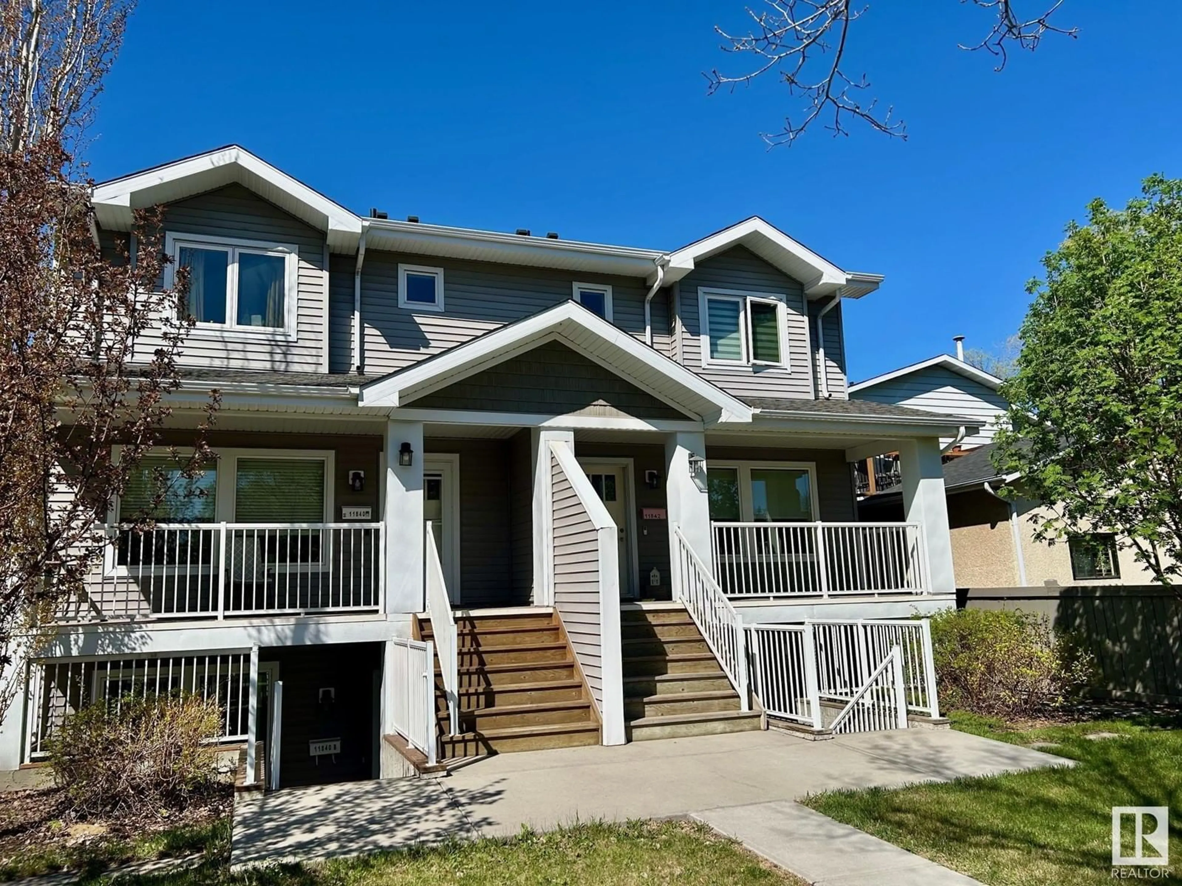 Home with vinyl exterior material, street for NW - 11842 122 ST, Edmonton Alberta T5L0C2