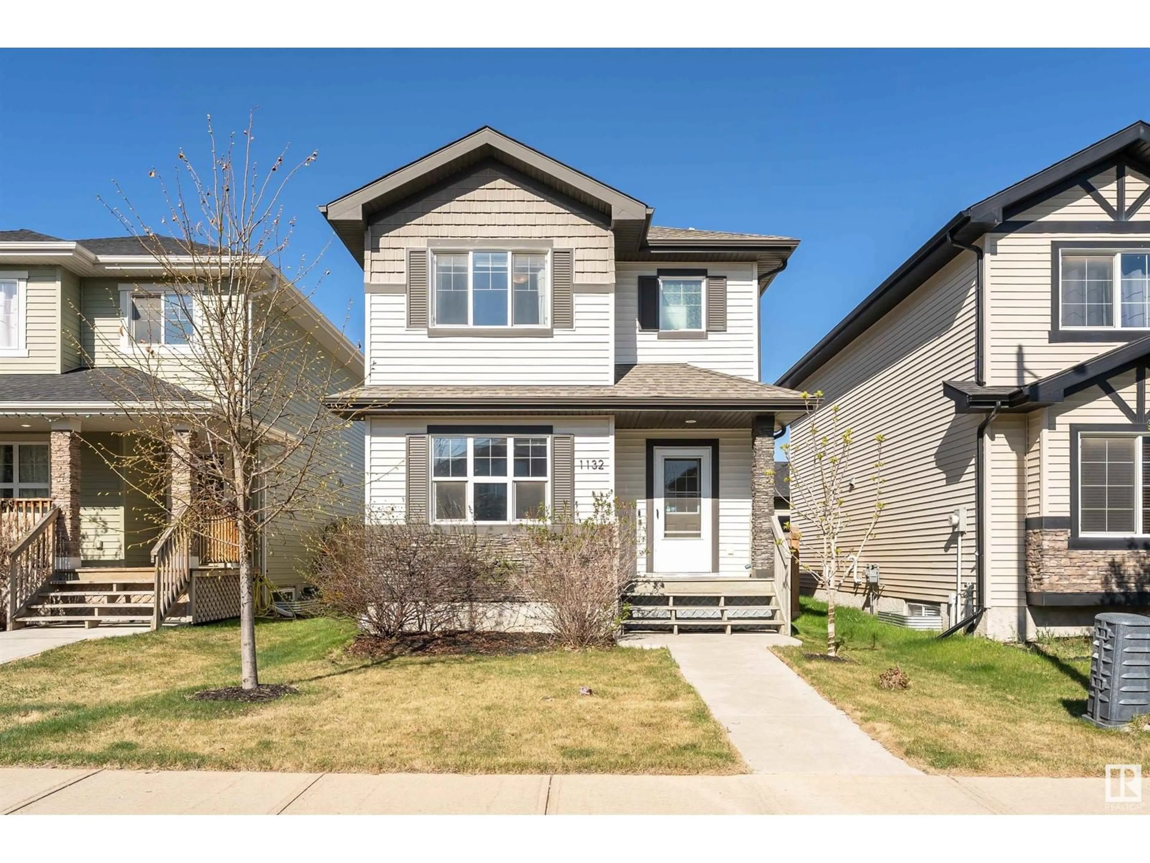 Home with vinyl exterior material, street for SW - 1132 177 ST, Edmonton Alberta T6W1Z9