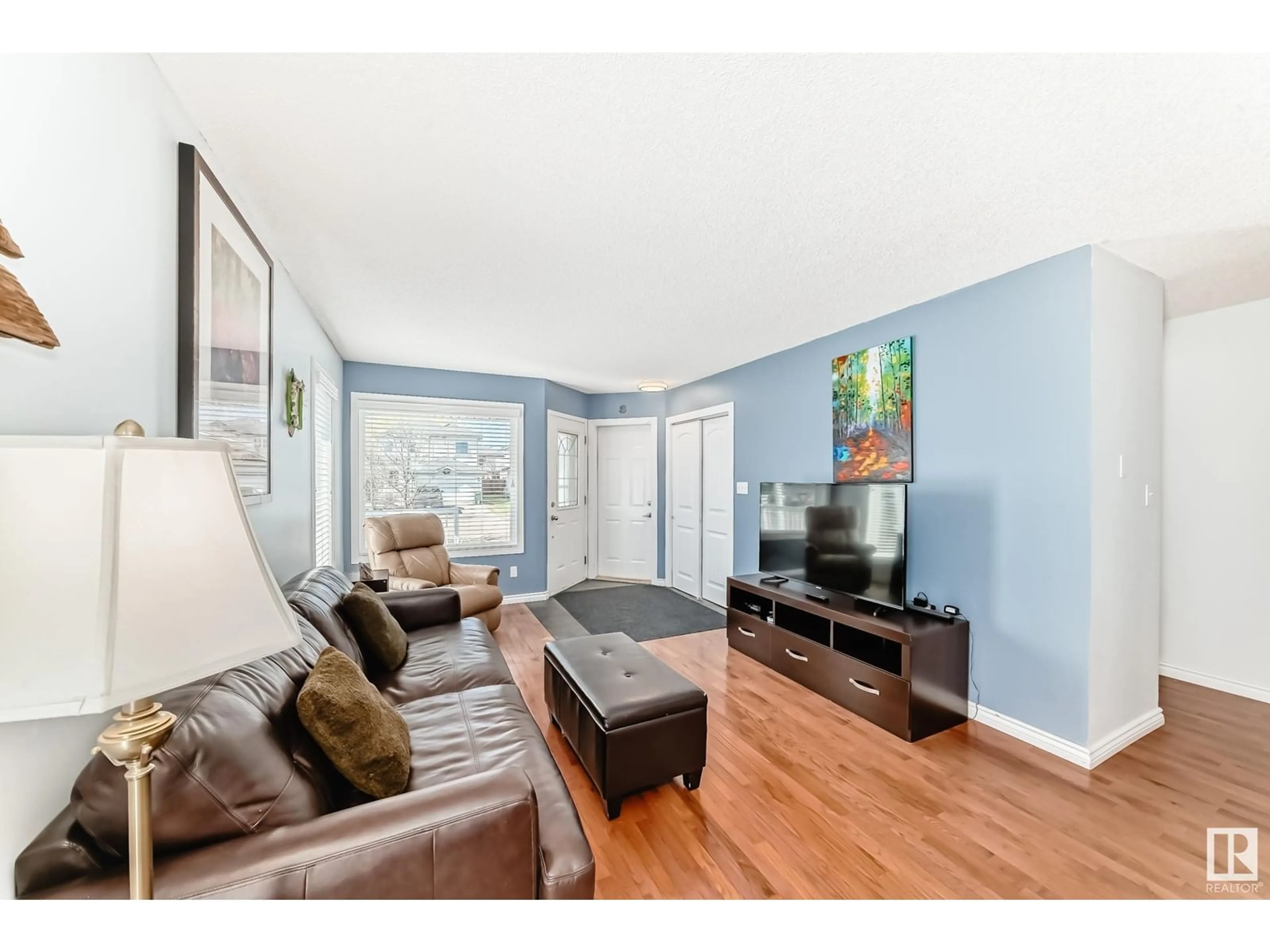 Living room with furniture, wood/laminate floor for 9 DOMINION WY, St. Albert Alberta T8N6L3
