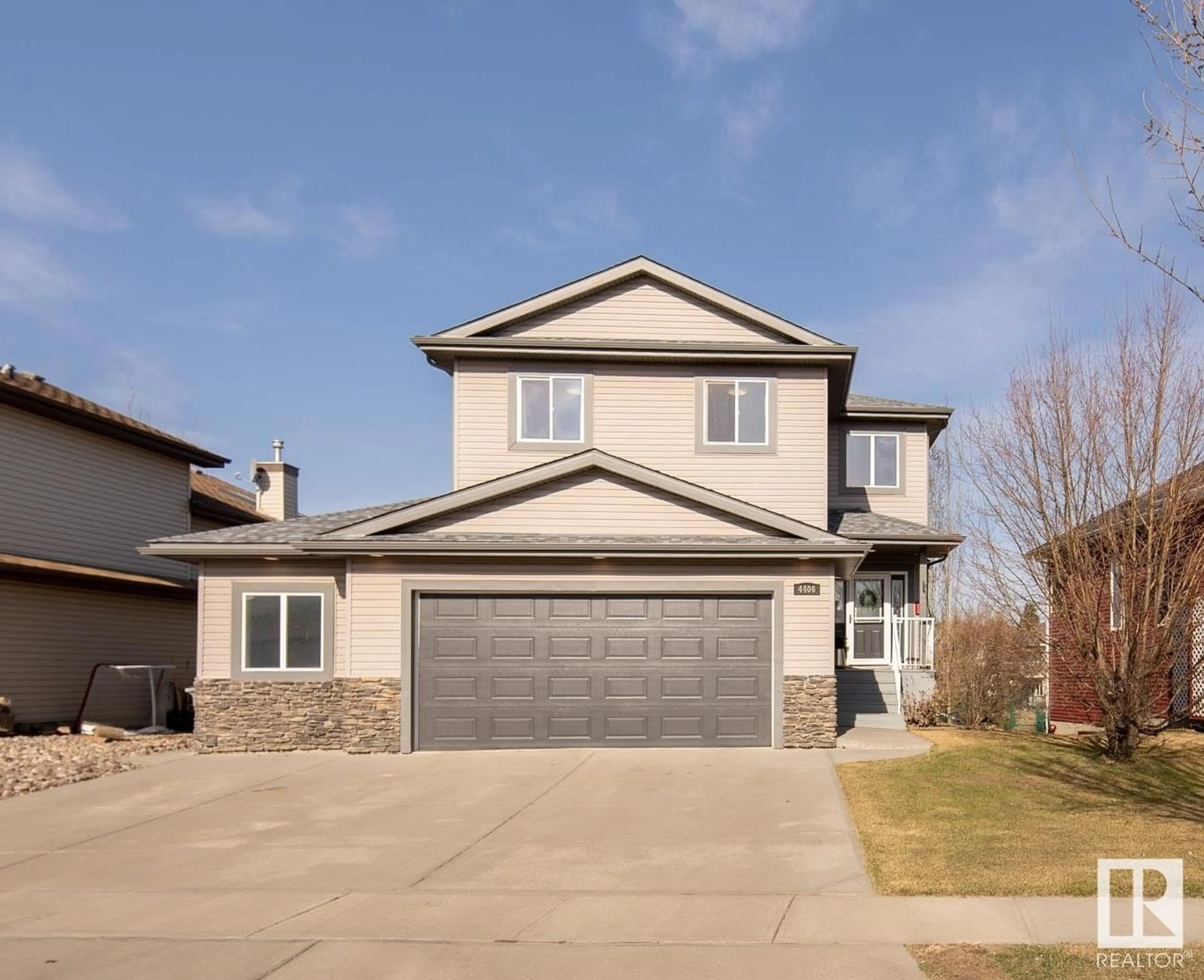 Home with vinyl exterior material, street for 4406 58 ST, Beaumont Alberta T4X1R7