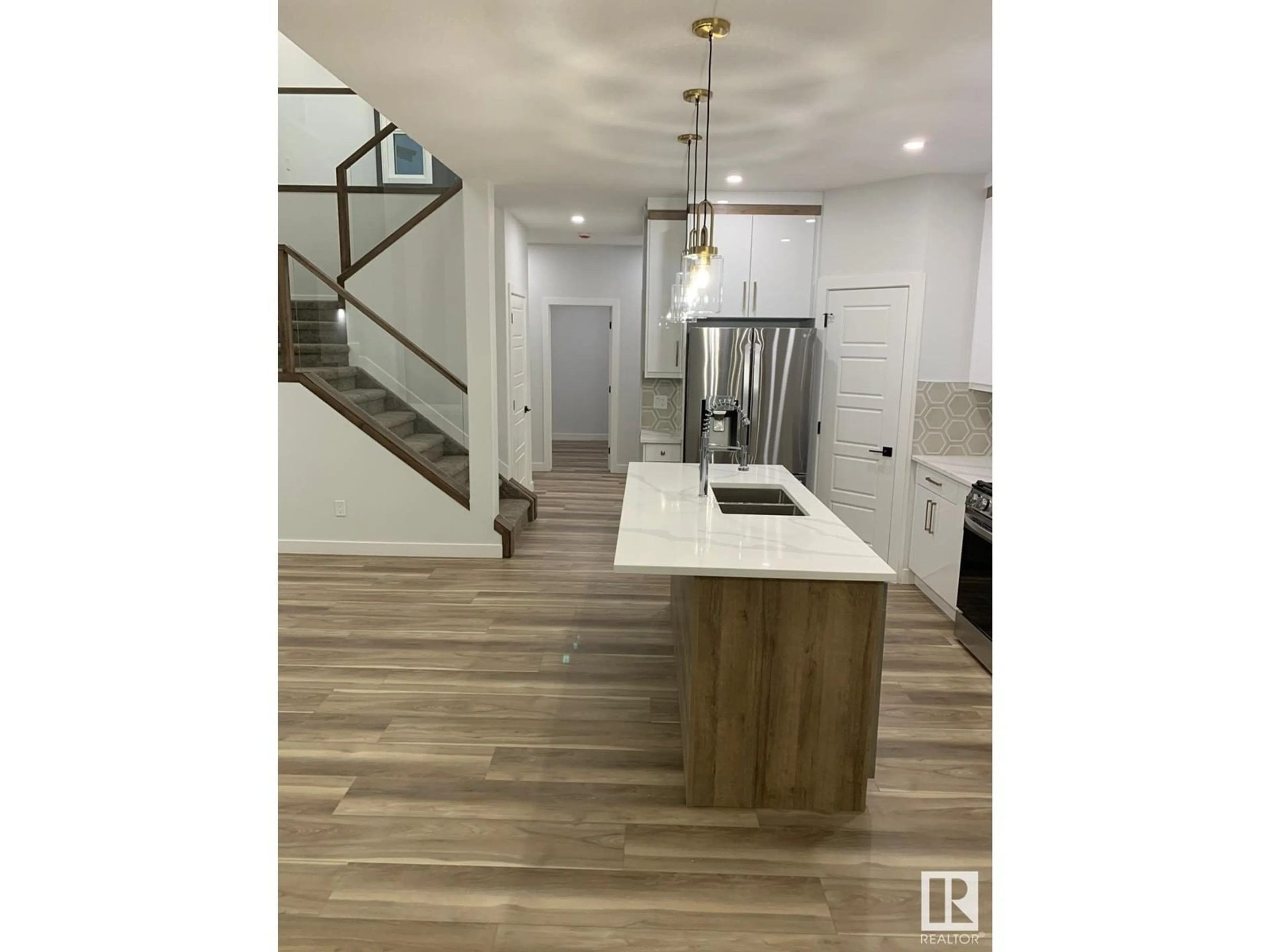 Open concept kitchen, unknown for 17 HULL WD, Spruce Grove Alberta T7X0X5