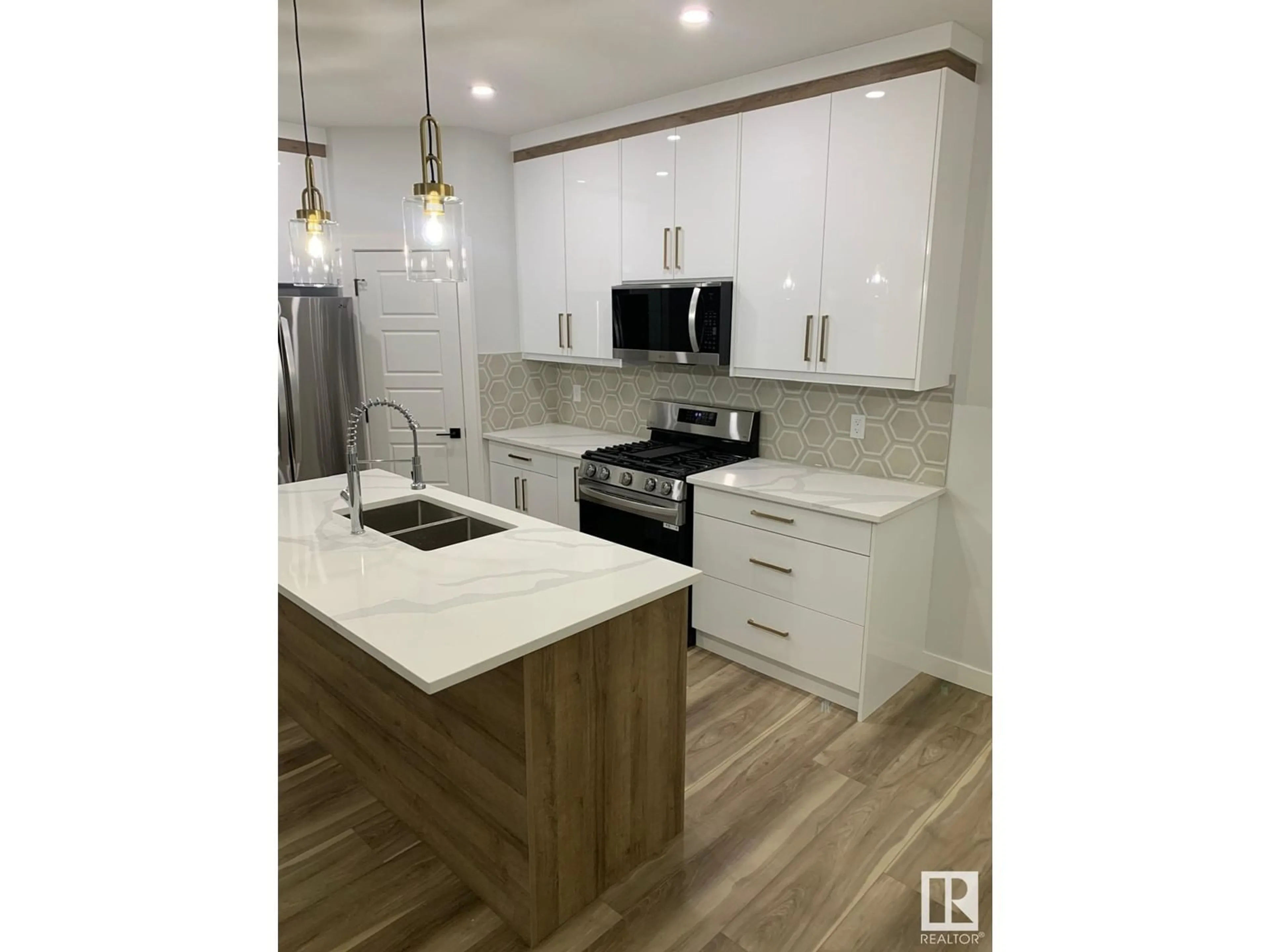 Open concept kitchen, unknown for 19 HULL WD, Spruce Grove Alberta T7X0X5