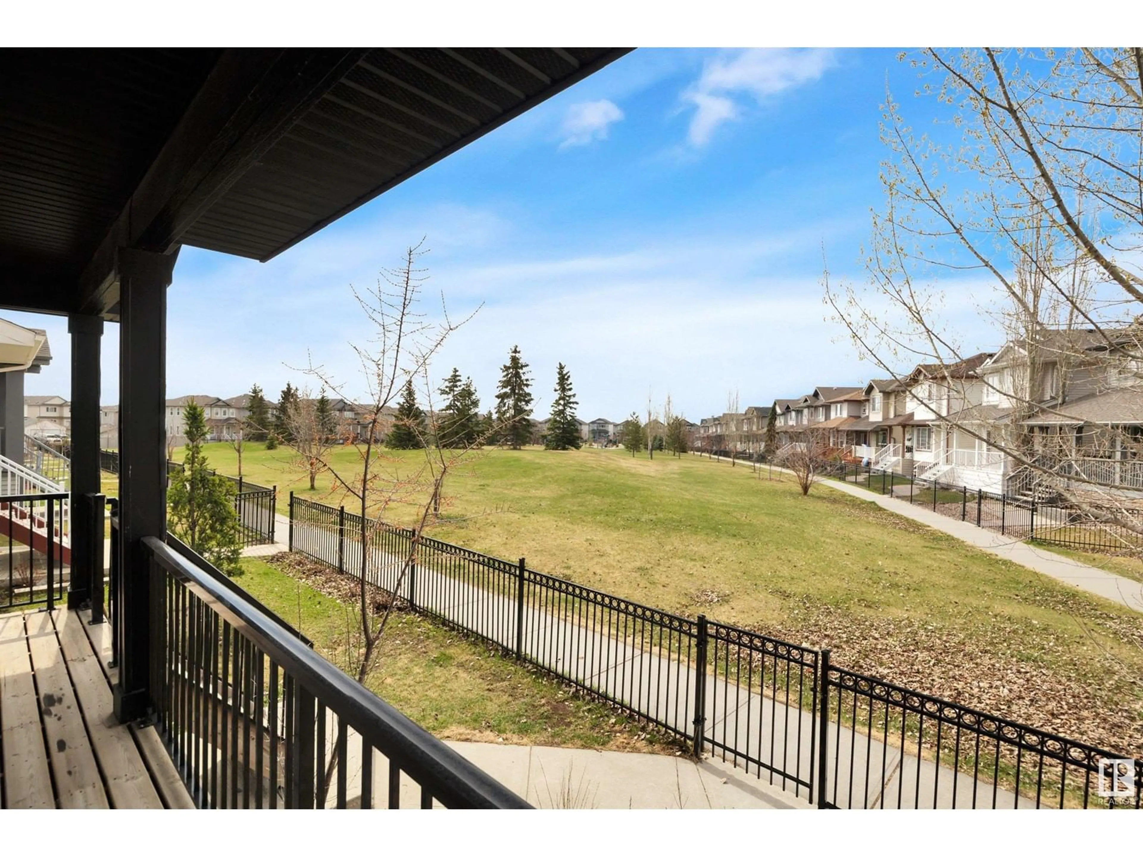 Patio, water/lake/river/ocean view for 70 STRAWBERRY LN, Leduc Alberta T9E8R6