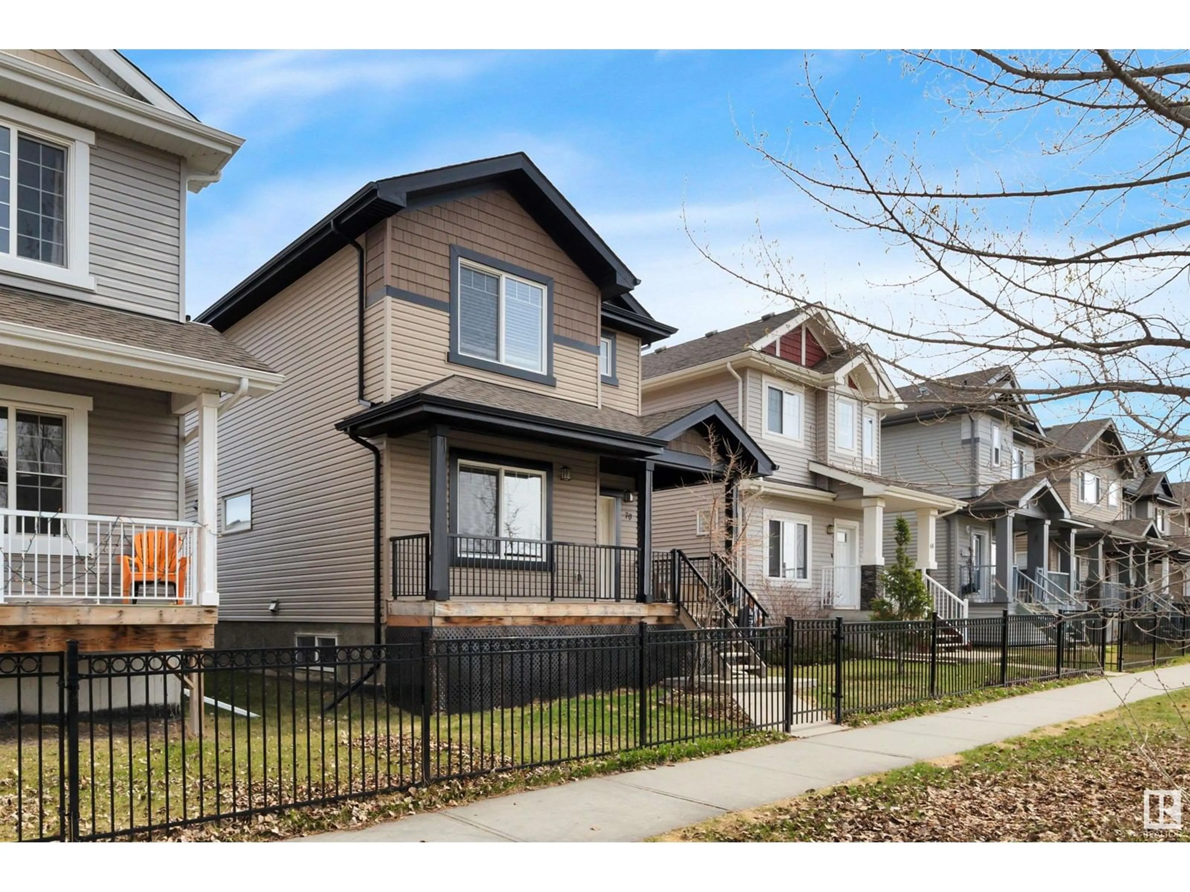 Home with vinyl exterior material, street for 70 STRAWBERRY LN, Leduc Alberta T9E8R6