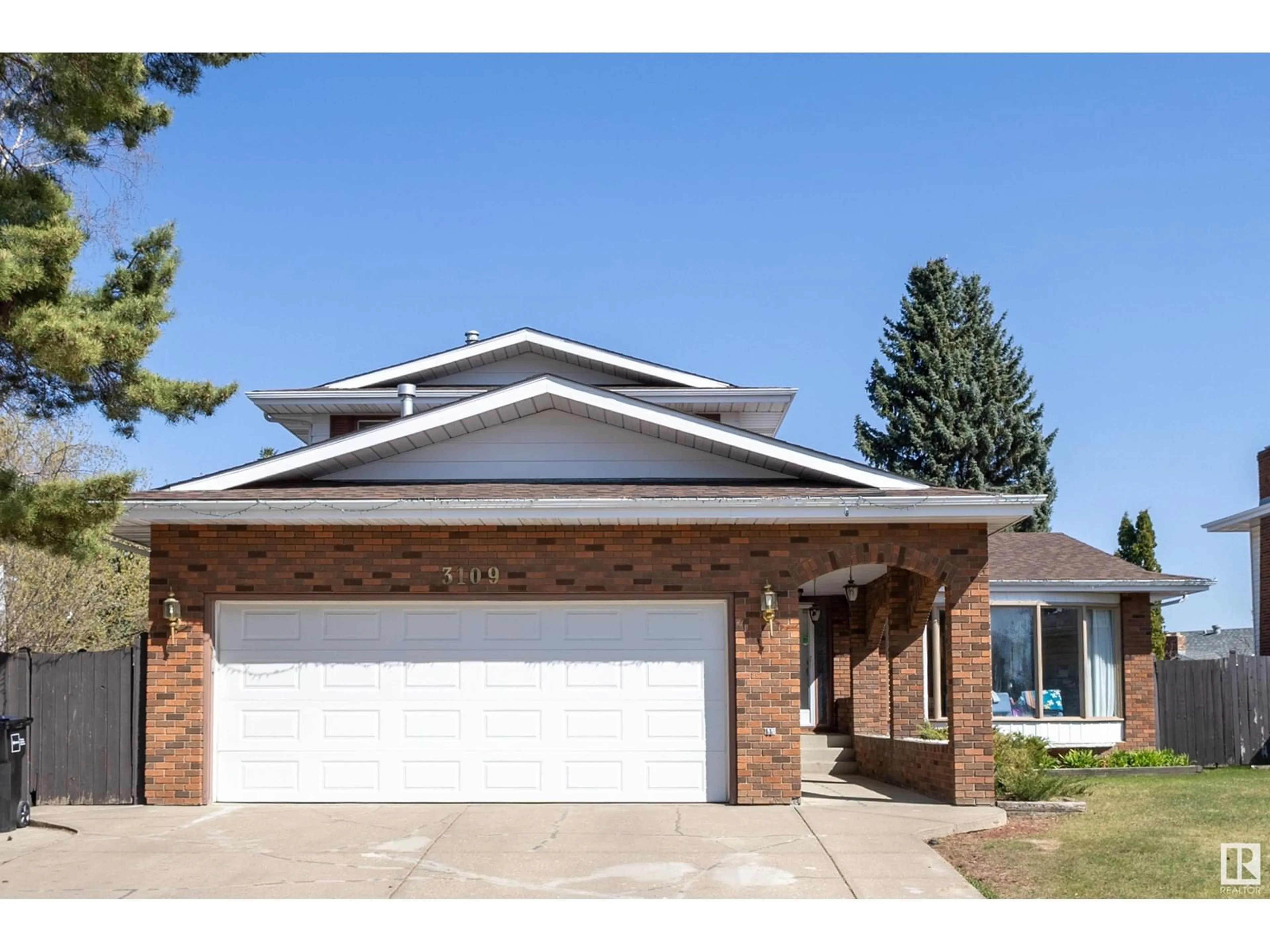 Home with brick exterior material, street for NW - 3109 112A ST, Edmonton Alberta T6J4G9