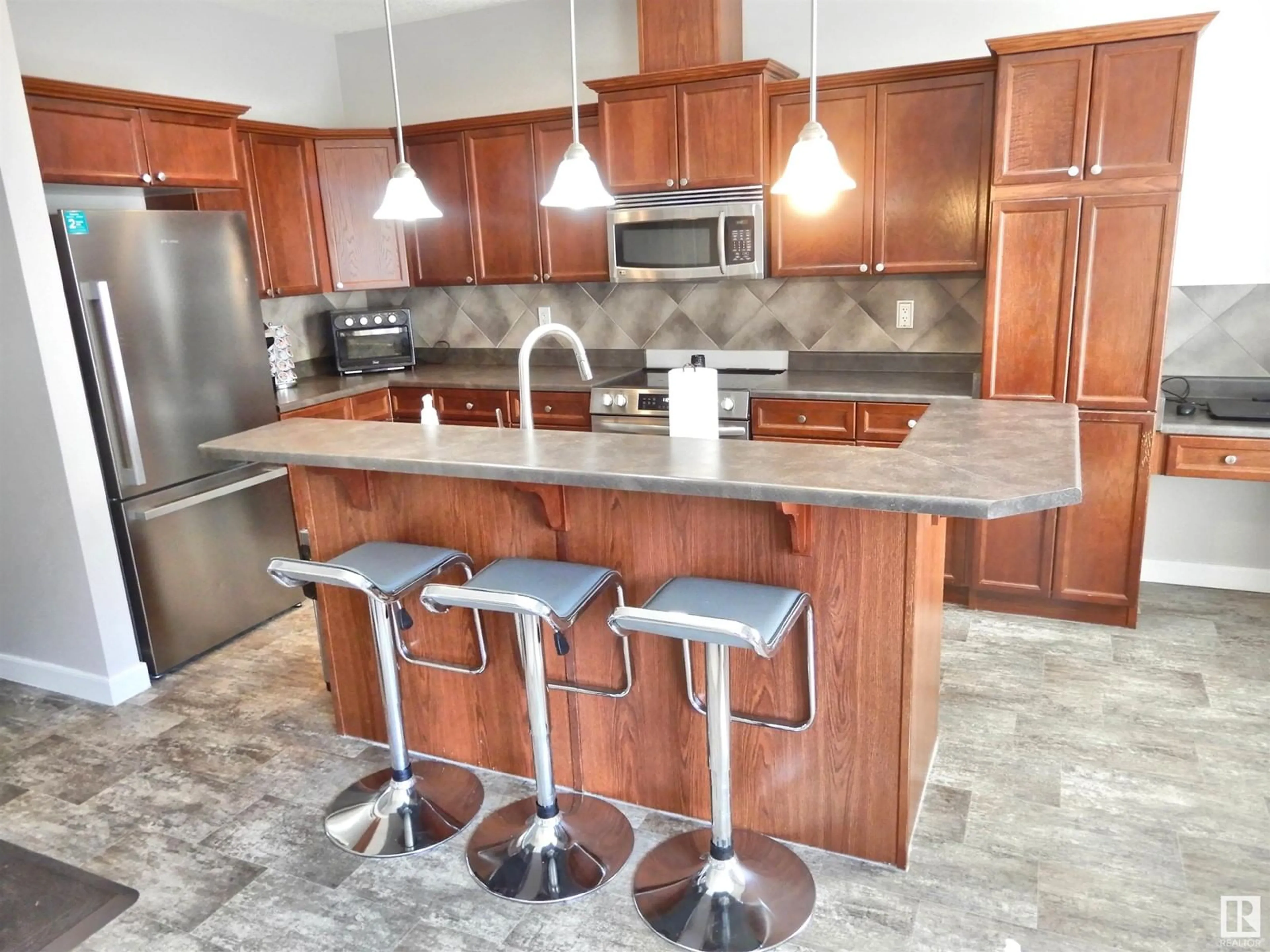 Open concept kitchen, ceramic/tile floor for #82 - 13825 155 AV NW, Edmonton Alberta T6V0B8