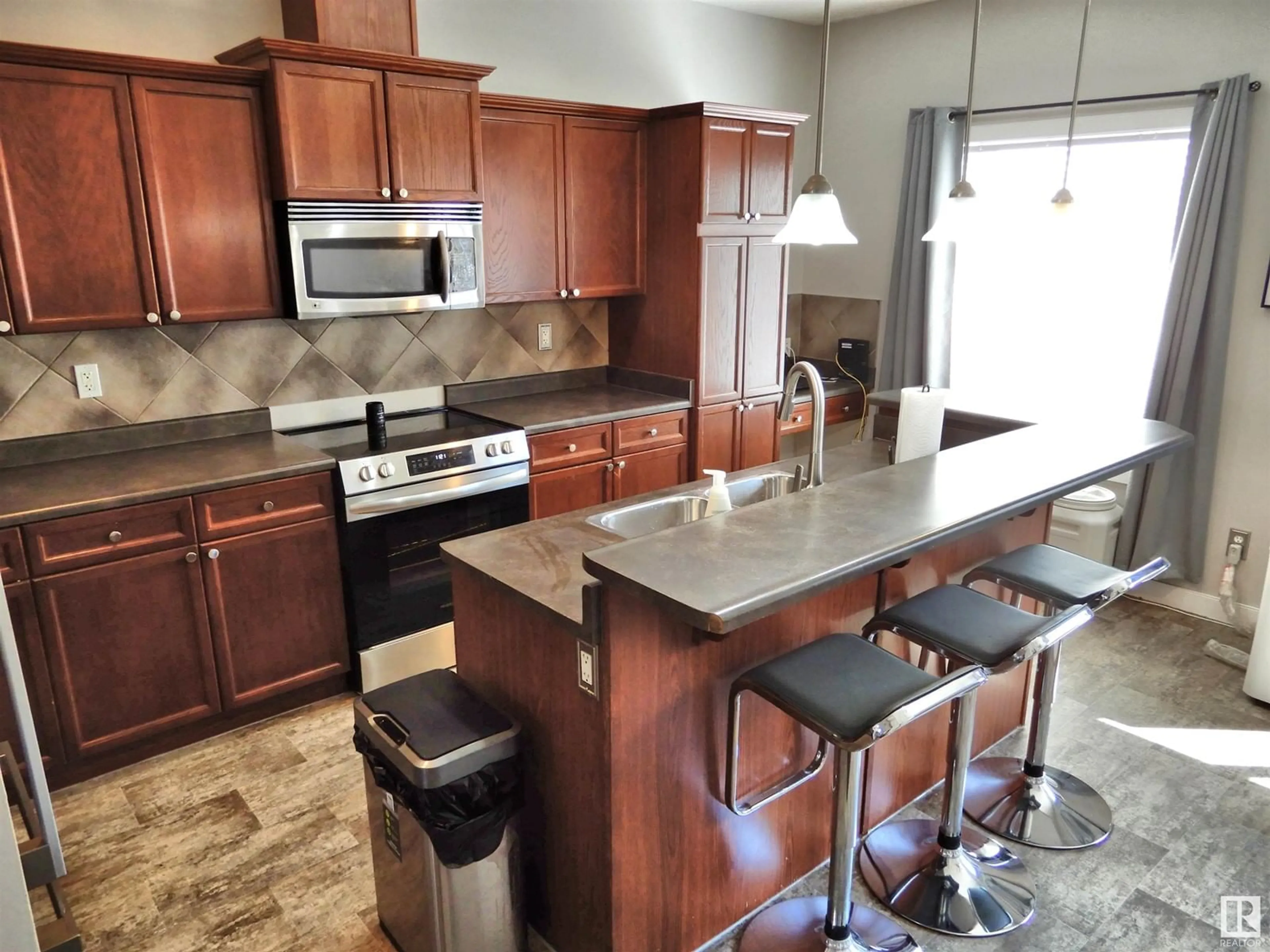 Open concept kitchen, ceramic/tile floor for #82 - 13825 155 AV NW, Edmonton Alberta T6V0B8
