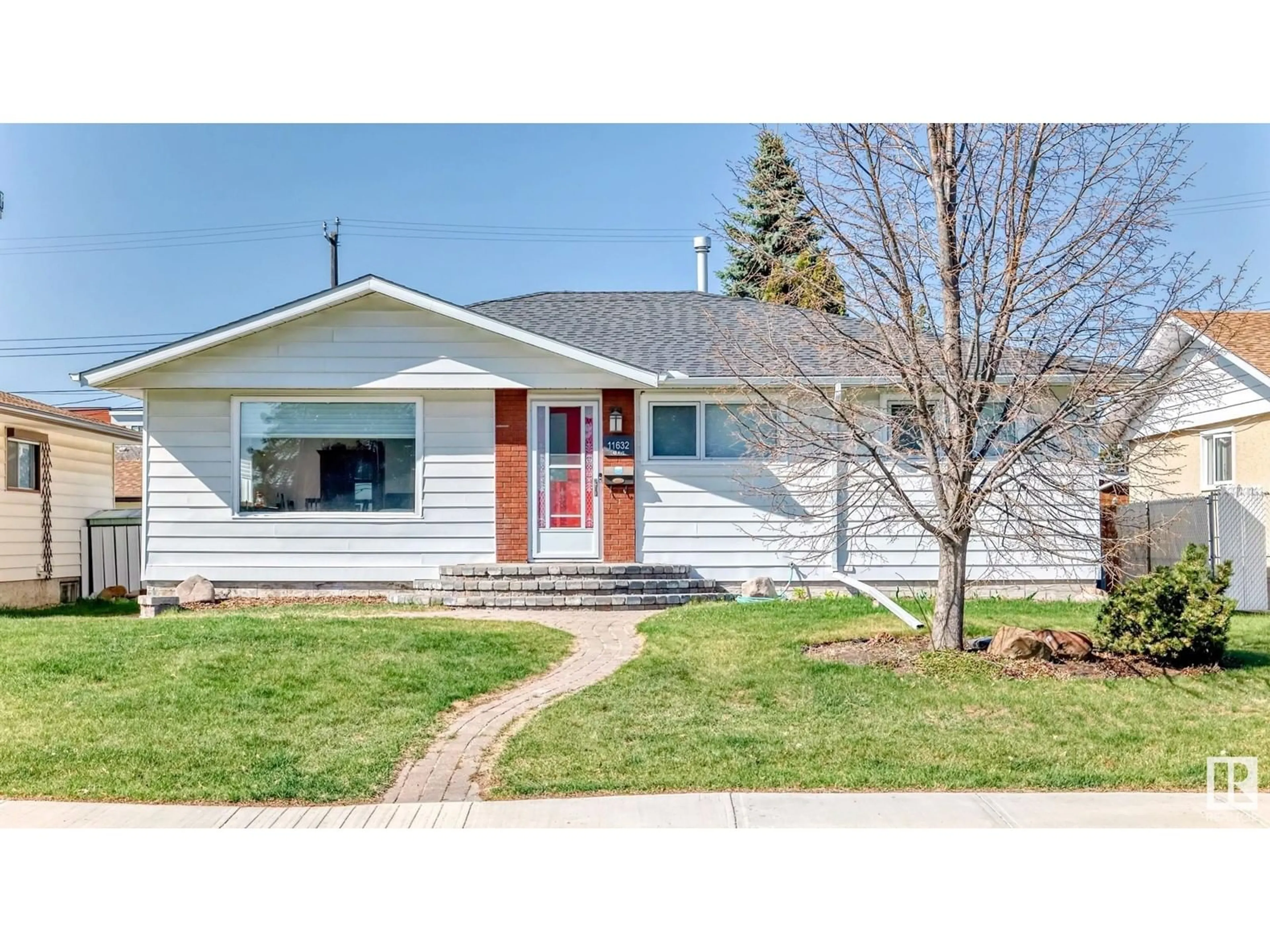 Home with vinyl exterior material, street for 11632 48 AV, Edmonton Alberta T6H0E6