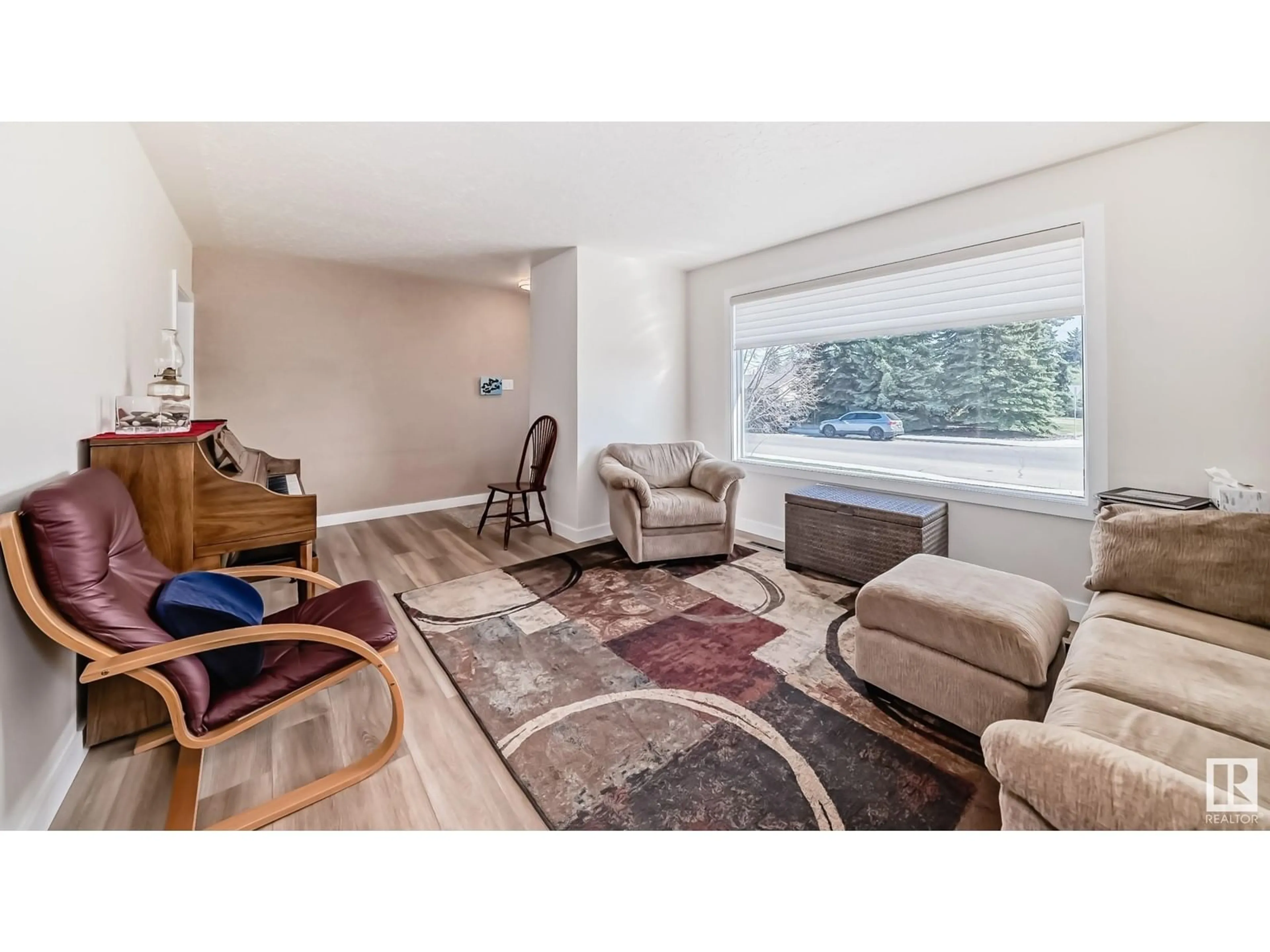 Living room with furniture, unknown for 11632 48 AV, Edmonton Alberta T6H0E6