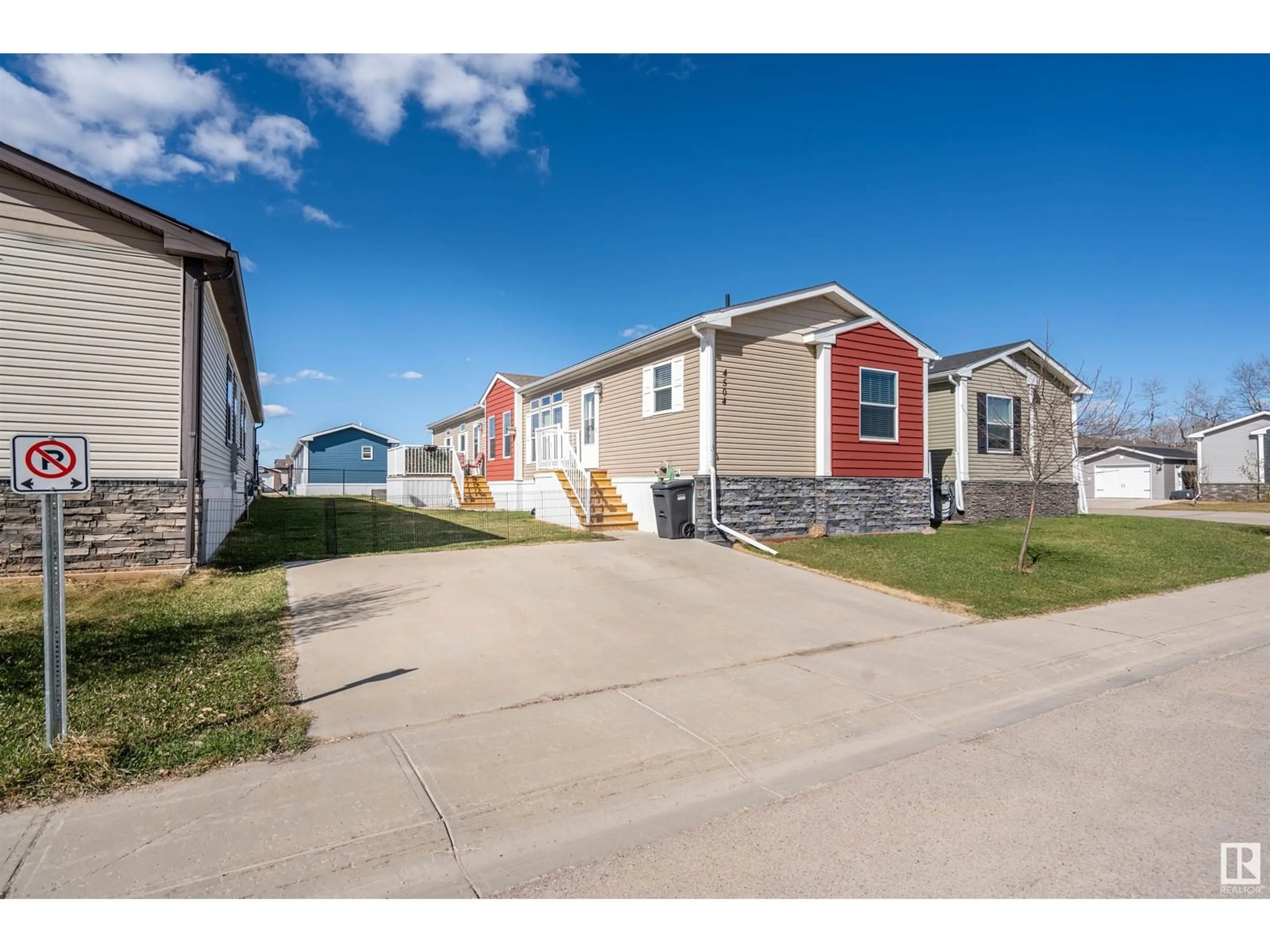 Home with vinyl exterior material, street for 4504 SNOWBIRD LN, Cold Lake Alberta T9M0C6