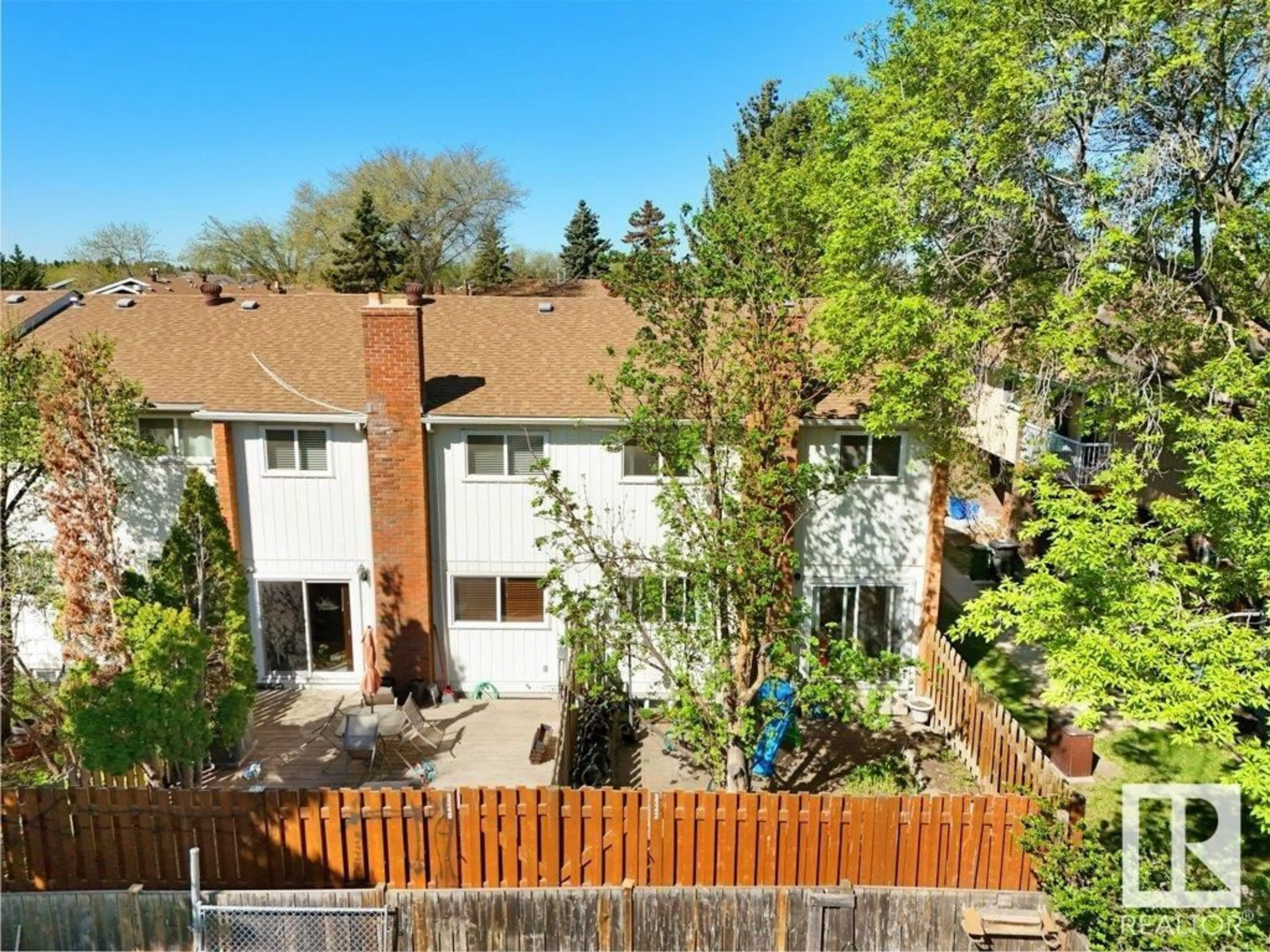 A pic from outside/outdoor area/front of a property/back of a property/a pic from drone, forest/trees view for 3242 130A AV, Edmonton Alberta T5A3K3