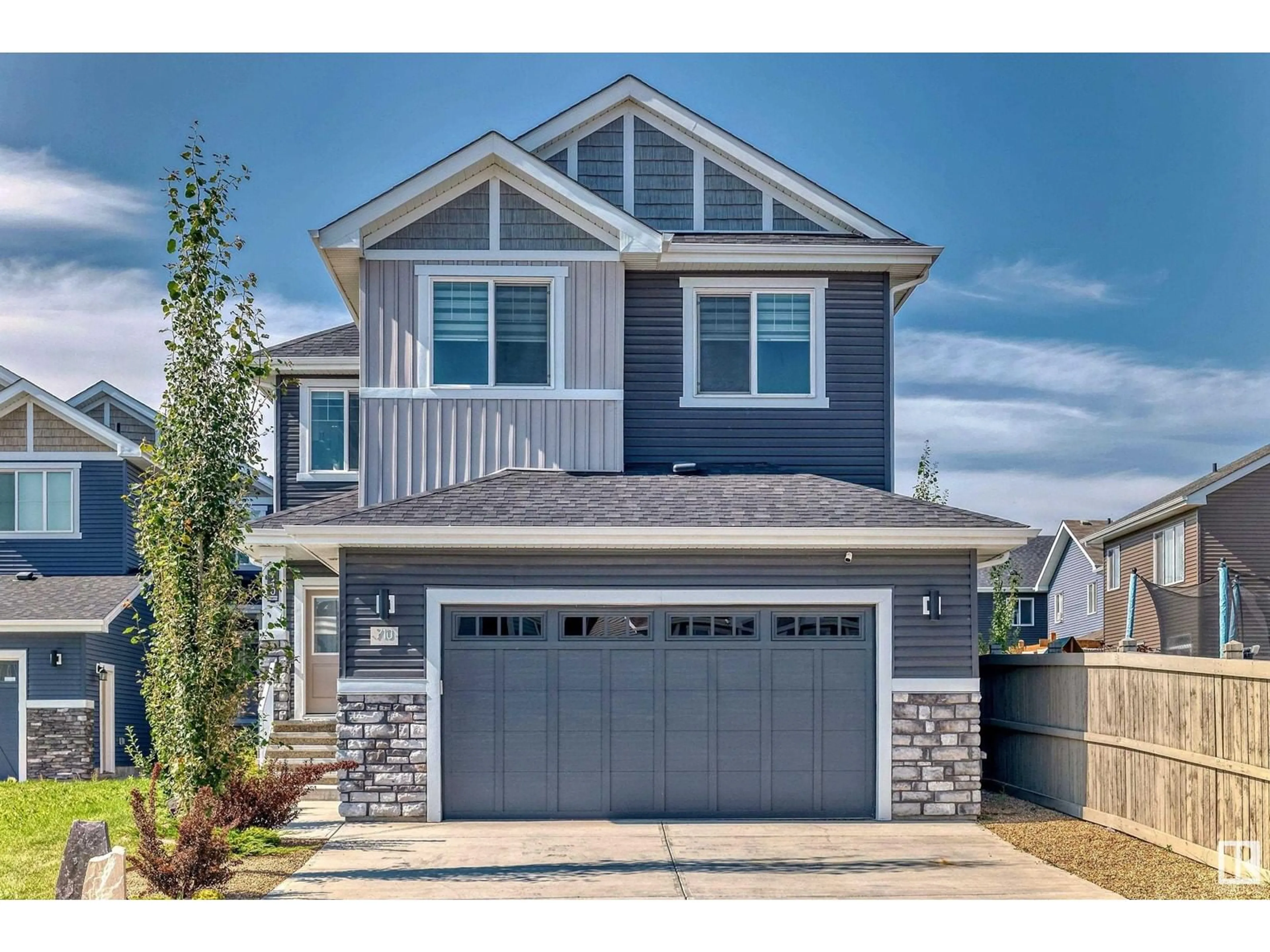 Home with vinyl exterior material, street for 710 EBBERS PL, Edmonton Alberta T5Y3V3